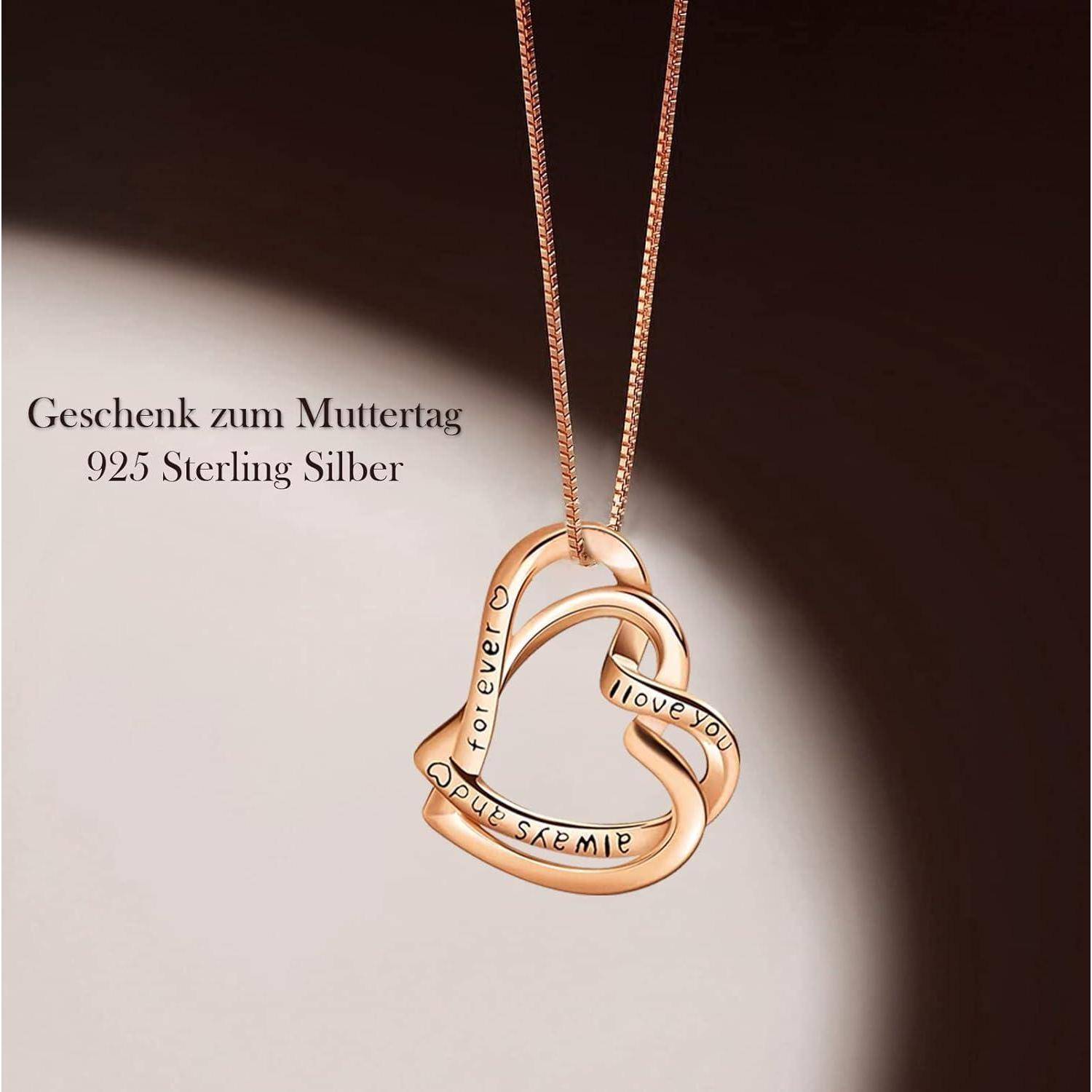 Eine herzförmige Anhänger-Halskette mit den Aufschriften ‚Ich liebe dich', ‚immer' und ‚für immer', die als Muttertagsgeschenk aus 925er Sterlingsilber beworben wird.