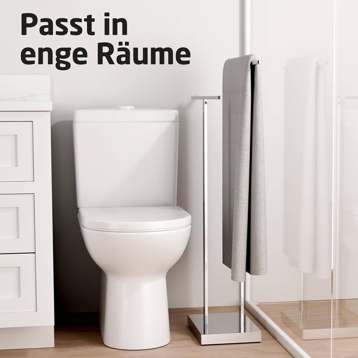 Eine kompakte Toilette und ein Handtuchständer fügen sich unauffällig in einen kleinen Badezimmerraum ein, mit einem Schrank auf der linken Seite und dem Text 