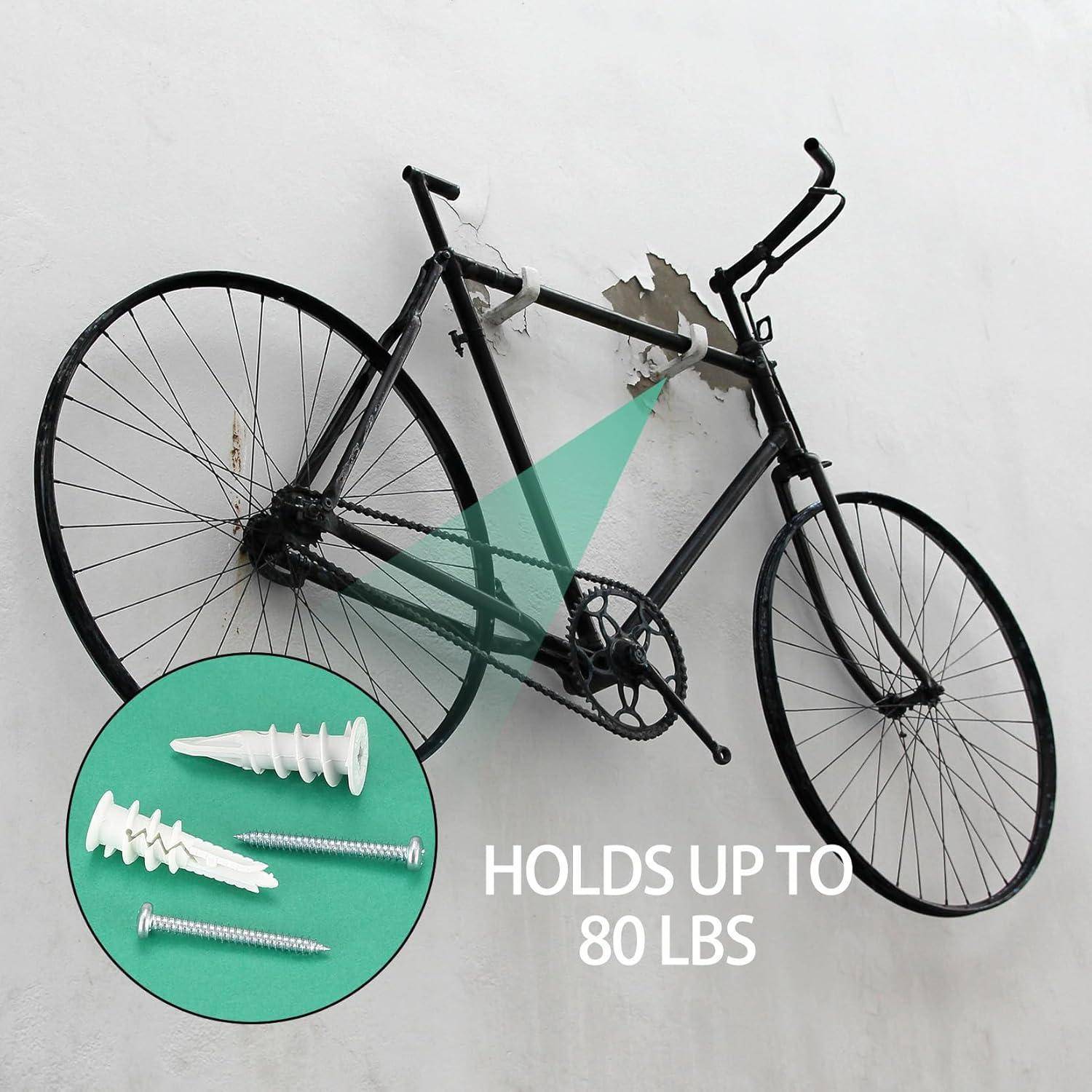 Ein Fahrrad ist mit Schrauben und Dübeln an einer Wand befestigt. Der Text besagt ‚Hält bis zu 36 kg', und betont damit die Tragfähigkeit der Montagebeschläge.