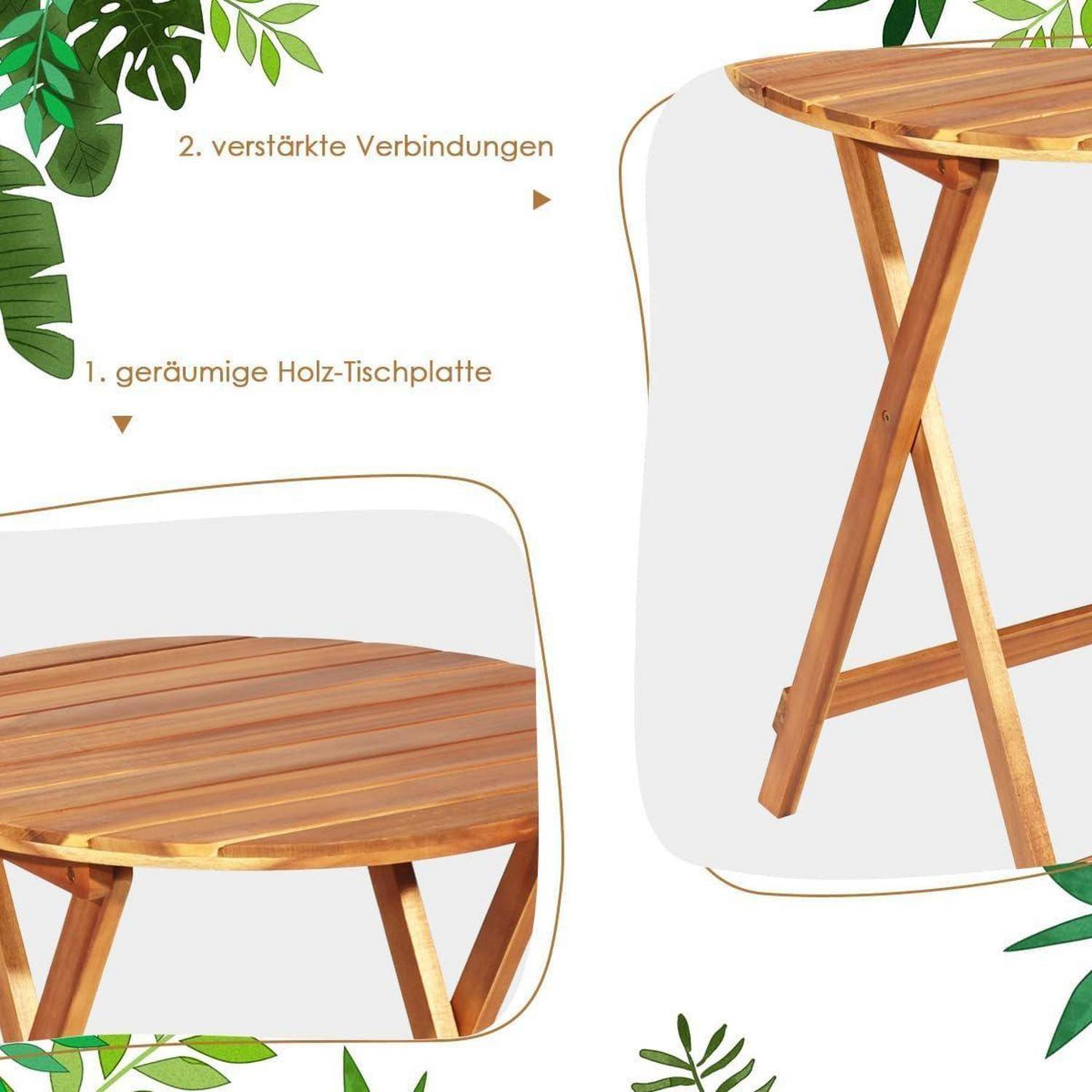 Ein Holztisch mit gekreuzten Beinen. Texthervorhebungen zeigen '1. geräumige Holz-Tischplatte' und '2. verstärkte Verbindungen'. Grüne Blätter schmücken die Ecken.