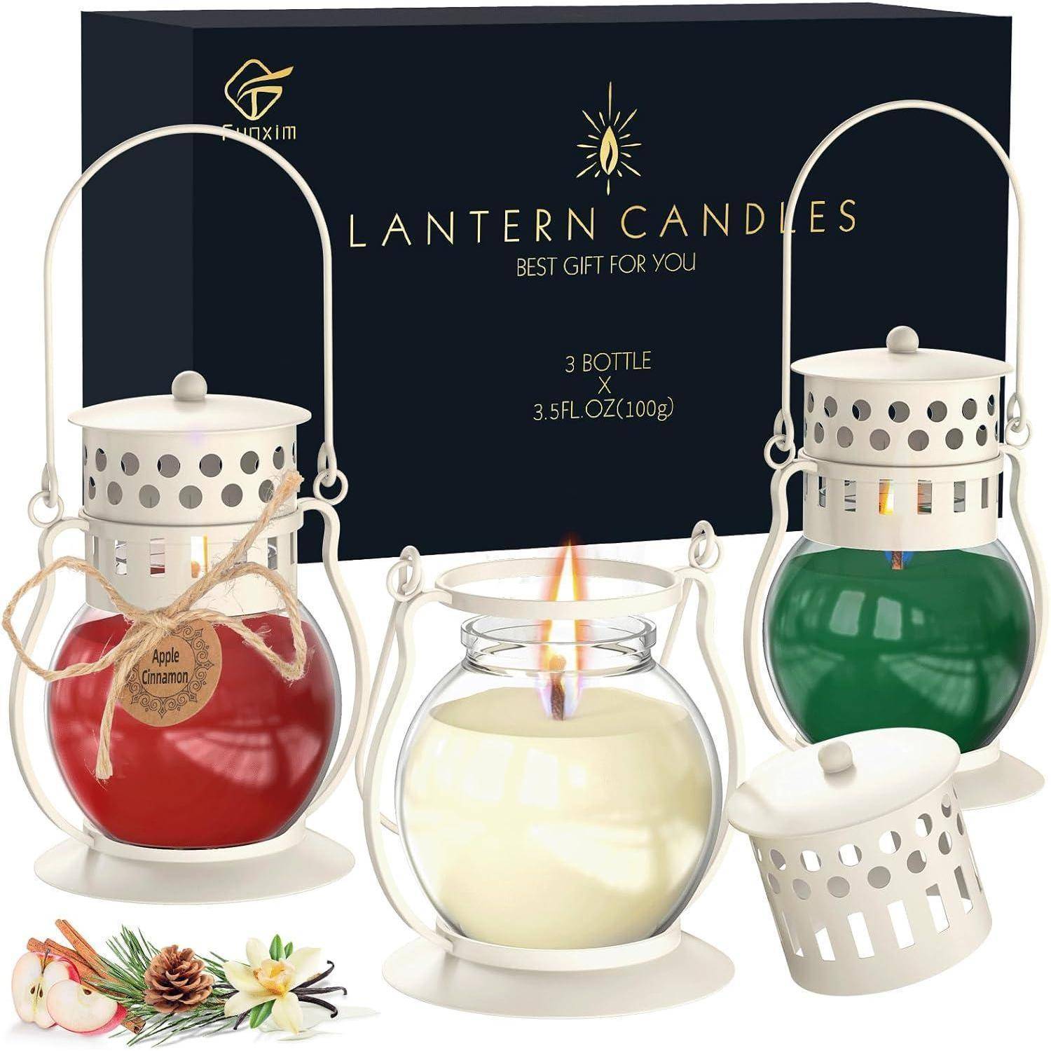 Laternenkerzen-Set von drei Glaslaternen in Rot, Weiß und Grün mit Metallgriffen. Verpackt als ‚Bestes Geschenk für Dich'.