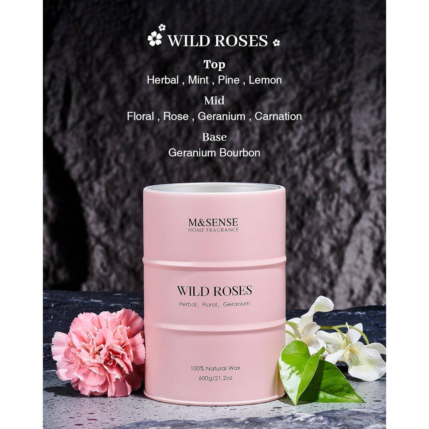 WILDE ROSEN' Duftkerze von M&SENSE in einem rosa Glas. Duftnoten: herb, Minze, blumig, Rose, Geranium. 100% natürliches Wachs.