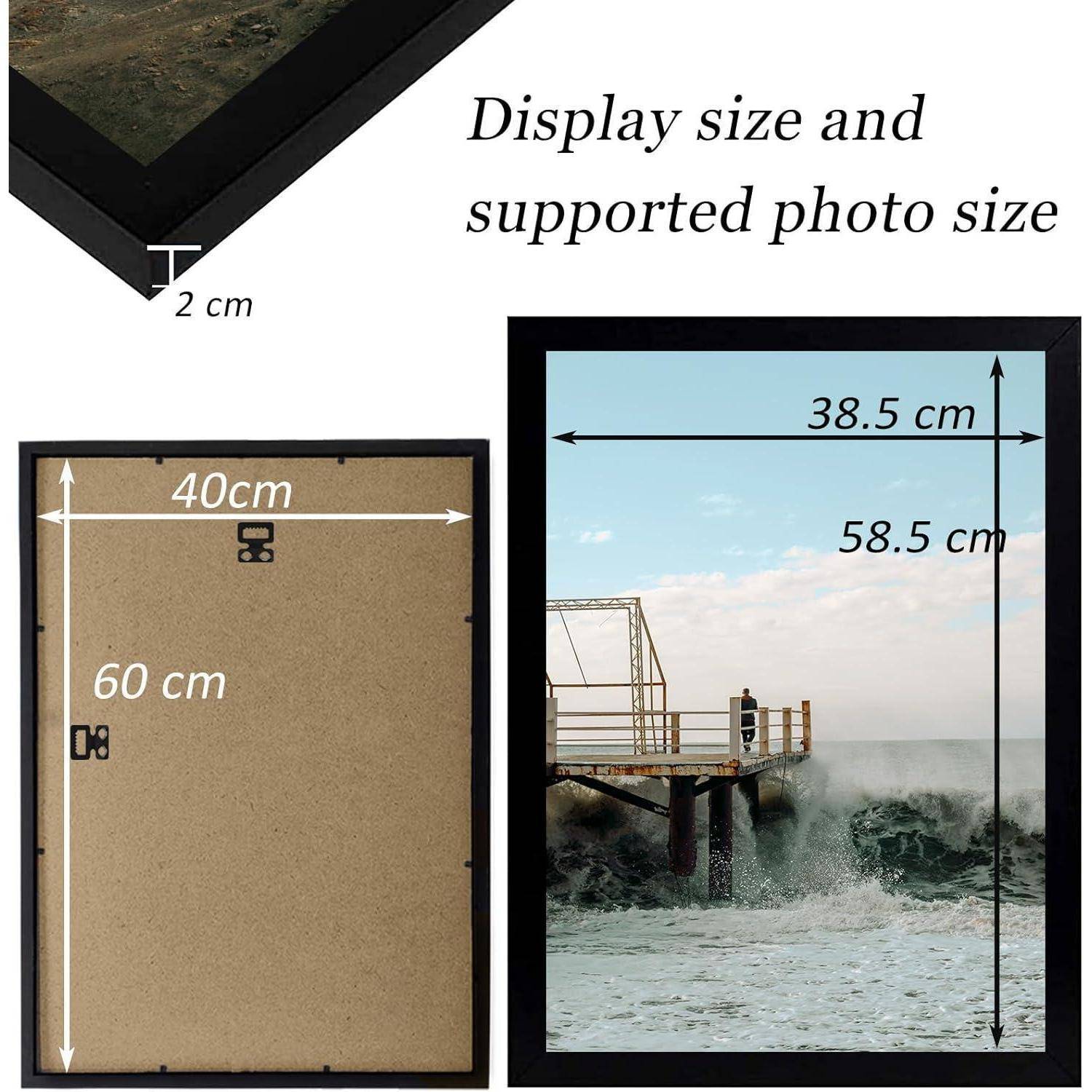 Das Bild zeigt zwei schwarze Bilderrahmen. Die Anzeisgröße eines Rahmens beträgt 38,5 cm x 58,5 cm, und die unterstützte Fotogröße ist 40 cm x 60 cm.
