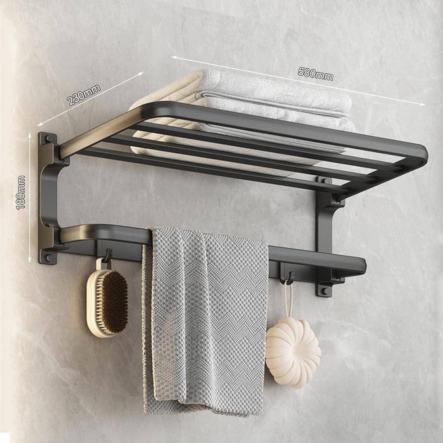 Wandmontierter Handtuchhalter mit zwei Ablagen, grau; obere Ablage zur Aufbewahrung gefalteter Handtücher, untere Ablage mit Haken zum Aufhängen von Bürste und Schwamm.