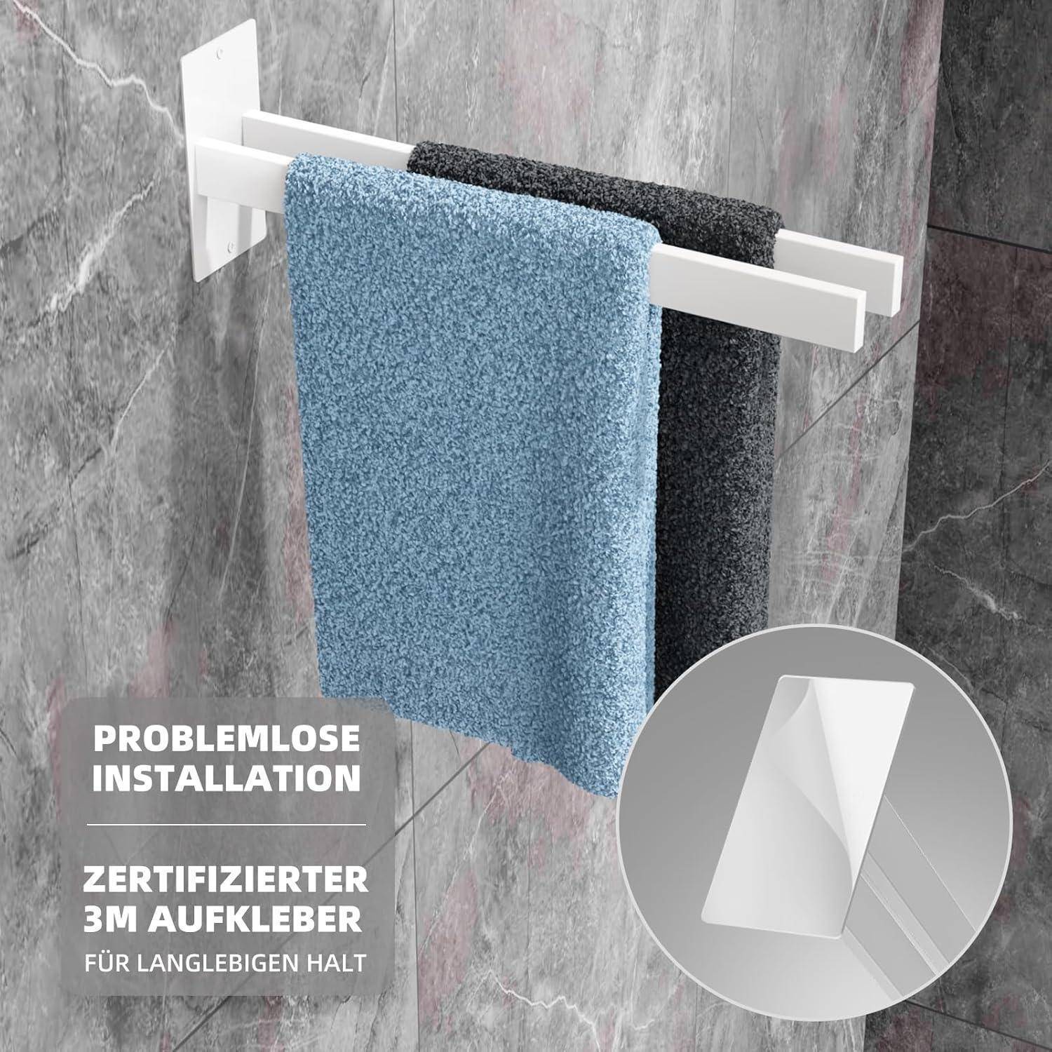 Zwei Handtücher hängen an einem wandmontiertem Handtuchhalter. Der Text hebt die 'problemlose Installation' mit '3M Aufklebern' hervor.