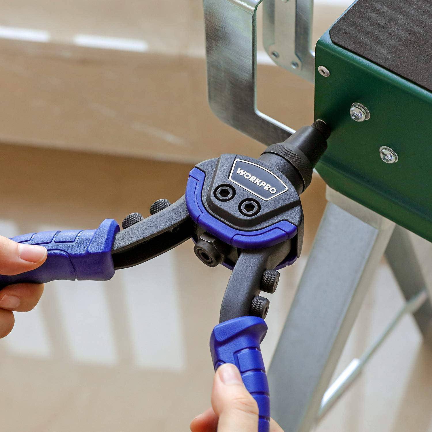 Eine Person verwendet eine blaue Nietklammermaschine, um einen Metallrahmen an einem grünen Objekt zu befestigen und zeigt dabei ein Werkzeug während eines Montageprozesses in Aktion.