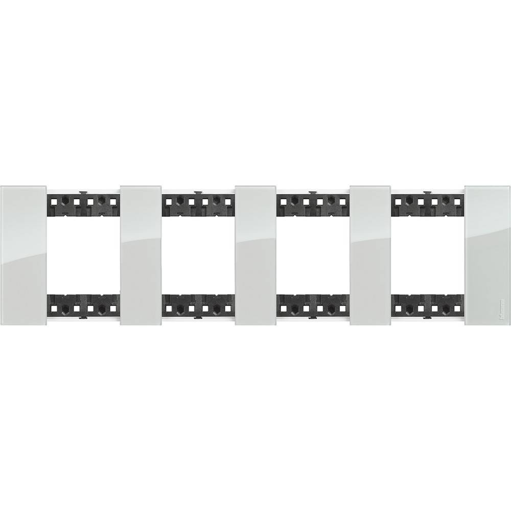Ein weißer, rechteckiger modularer Schalterrahmen mit mehreren Schlitzen für Schalter oder Steckdosen.