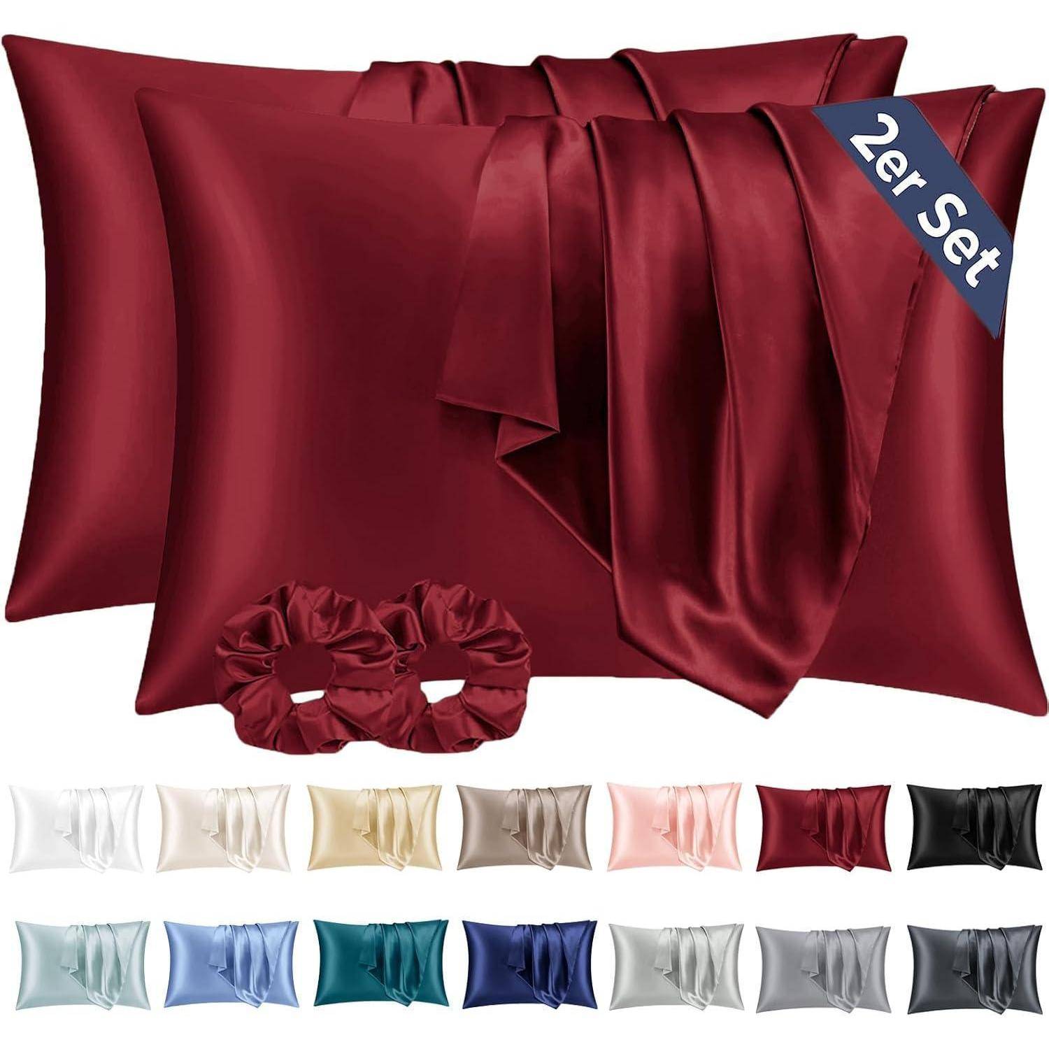Satin-Kissenbezüge und Haargummis in verschiedenen Farben mit glatter, glänzender Textur für Haar- und Hautpflege. Set enthält zwei Kissenbezüge.