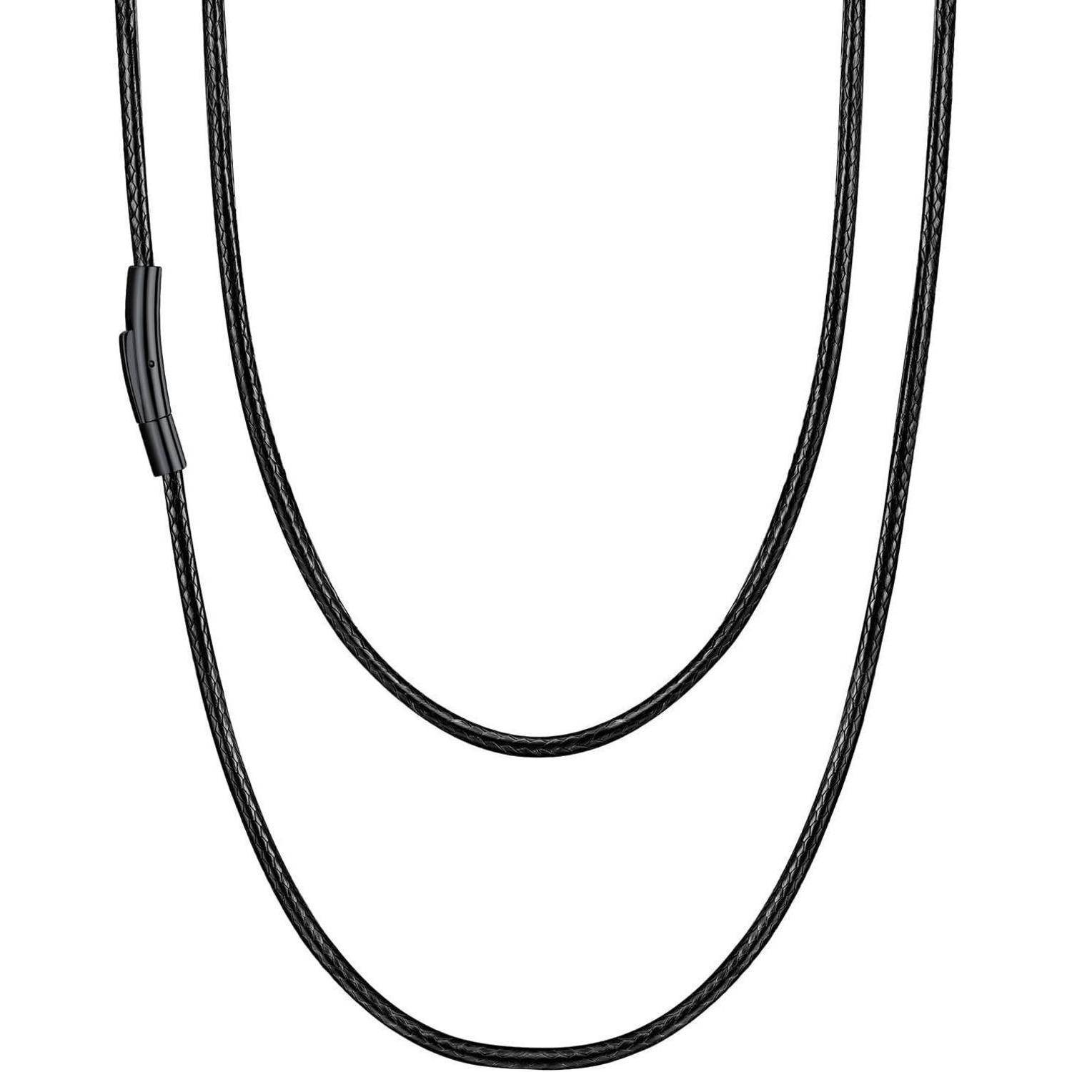 Ein schwarzes Doppelwickel-Armband mit einem schlanken Verschluss, das ein modernes und minimalistisches Design aufweist.
