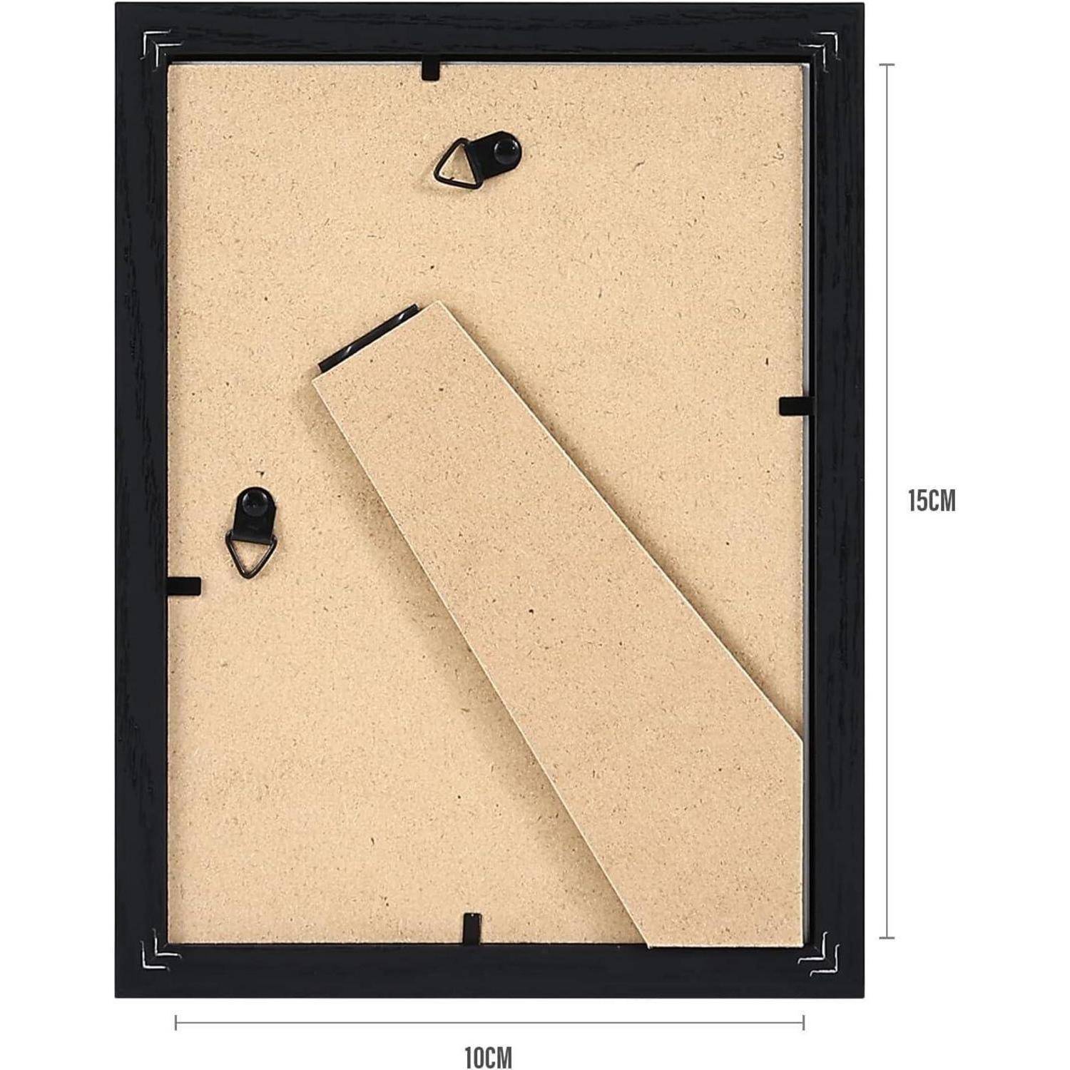 Rückansicht eines schwarzen Bilderrahmens mit Ständer und Aufhängehaken, misst 15 cm in der Höhe und 10 cm in der Breite.