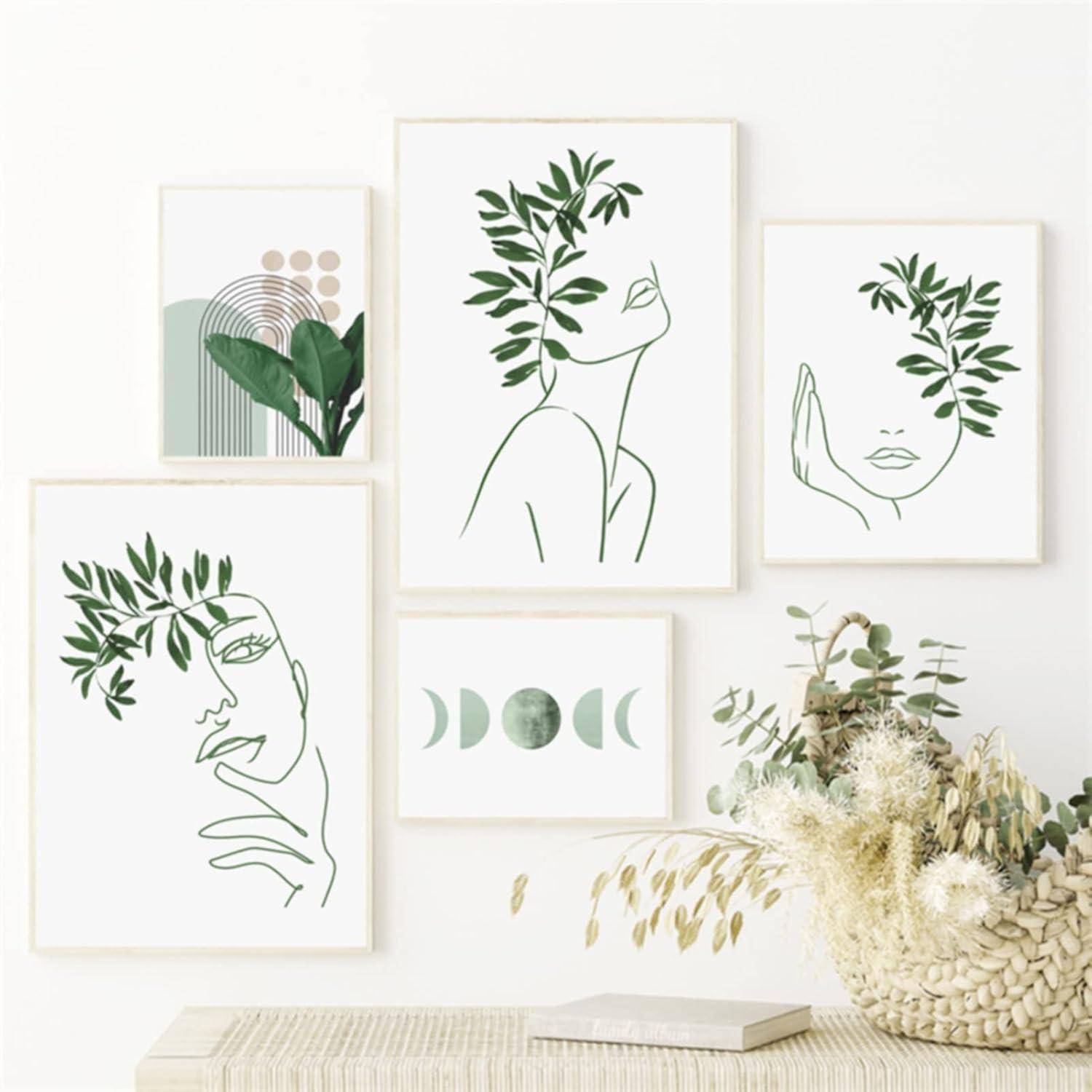 Eine Sammlung minimalistischer Linienkunstdrucke mit abstrakten Gesichtern und Pflanzenelementen, an einer Wand über einem neutralfarbenen Regal mit einer dekorativen Pflanze angeordnet.