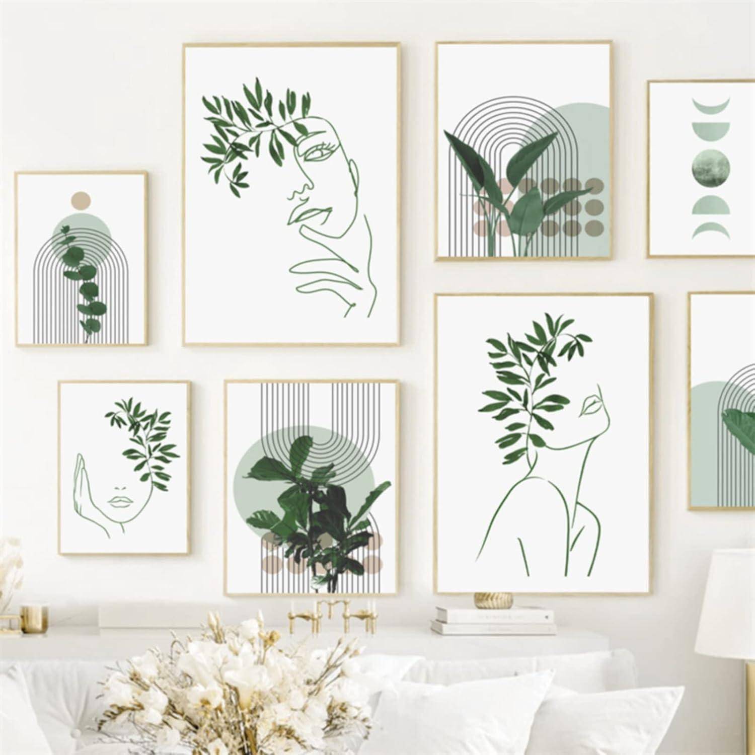 Eine minimalistische Galeriewand zeigt sechs gerahmte Kunstwerke mit abstrakten Linienzeichnungen und botanischen Elementen in Grün- und Beigetönen.