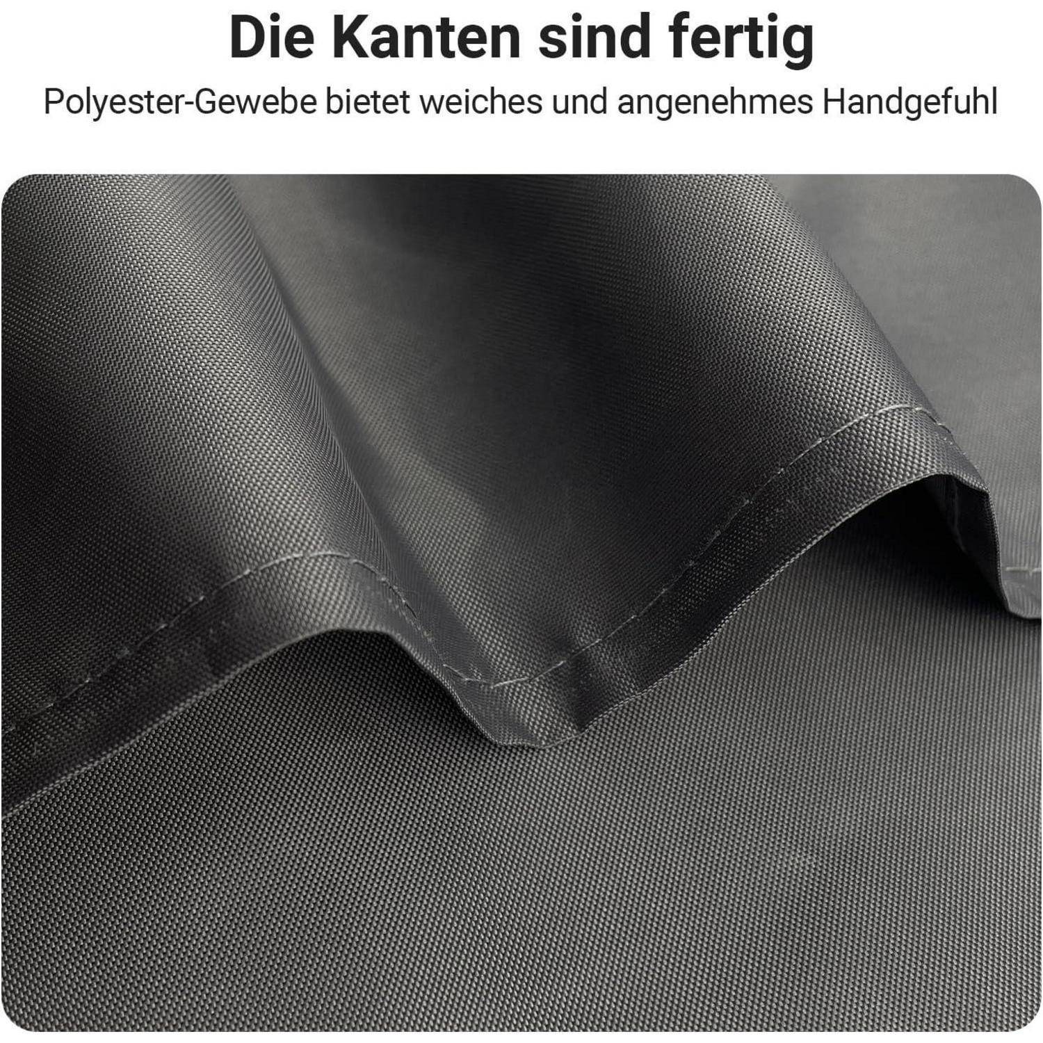 Die Kanten sind fertig' über einem gefalteten schwarzen Polyesterstoff, der seine weiche und angenehme Textur hervorhebt.