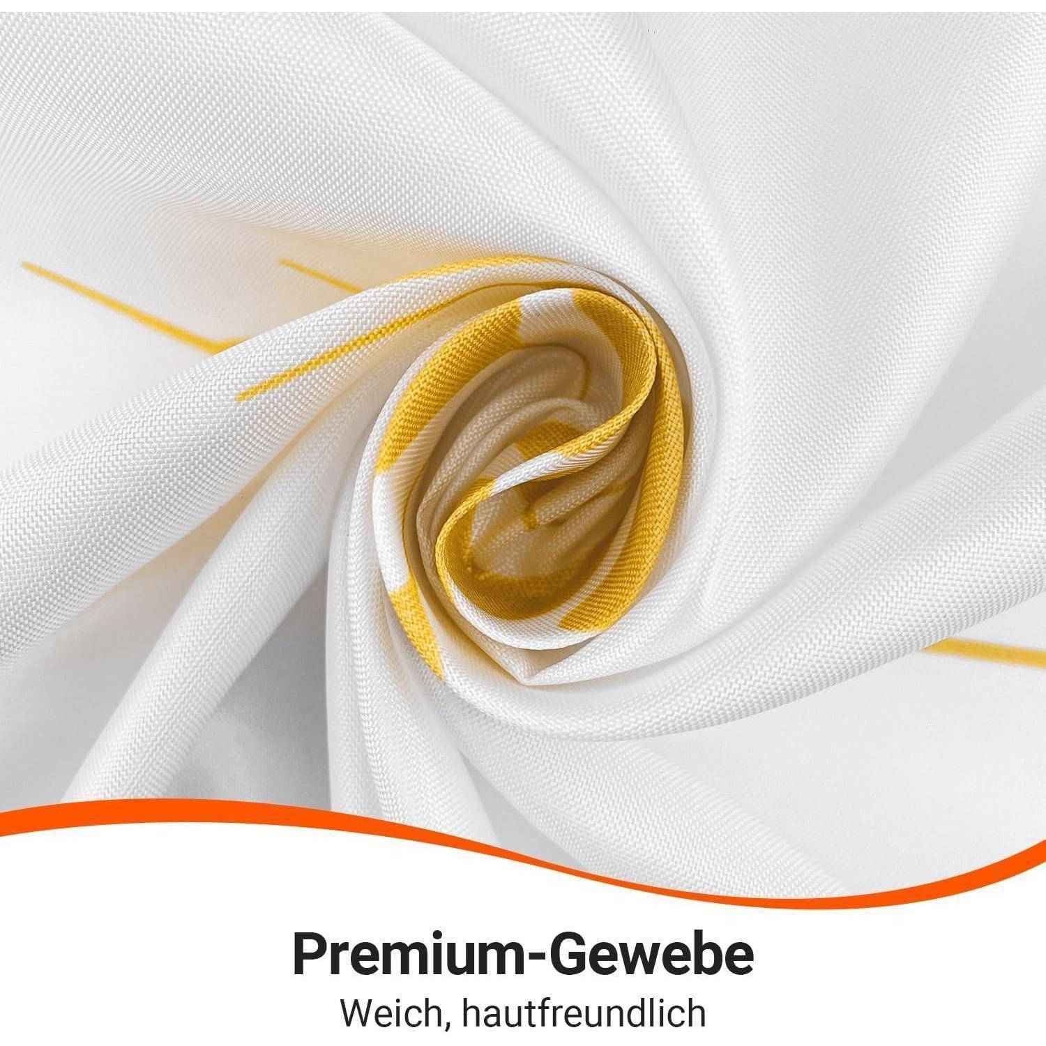 Ein Nahaufnahmebild zeigt weißen Stoff mit gelben Akzenten, der in einer Spiralmusterung gerollt ist. Der Text lautet: 'Premium-Gewebe Weich, hautfreundlich.
