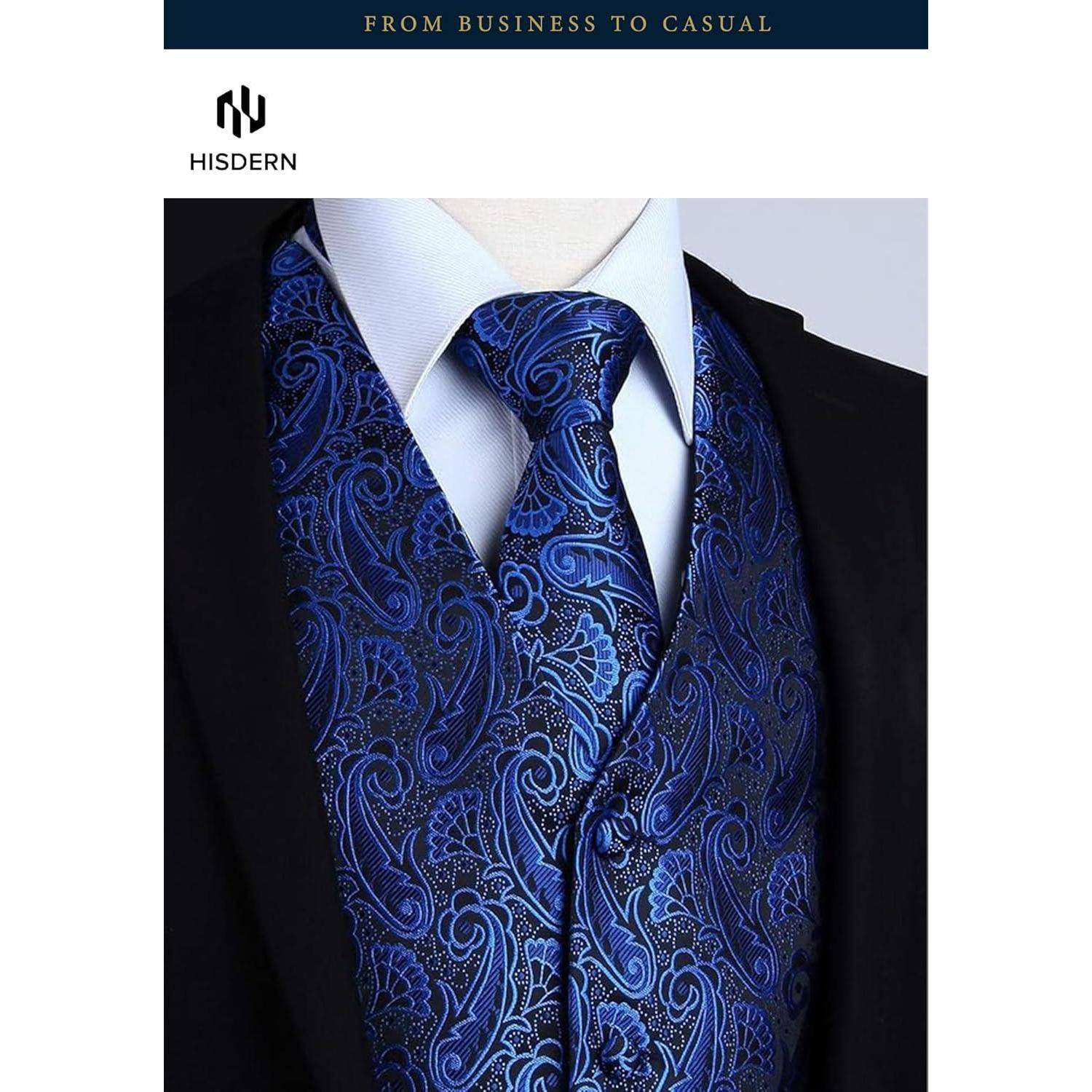 Eine Nahaufnahme einer marineblau gemusterten Paisley-Krawatte und einer Weste, kombiniert mit einem weißen Hemd und einem schwarzen Anzug, die einen Business-Casual-Stil andeuten.