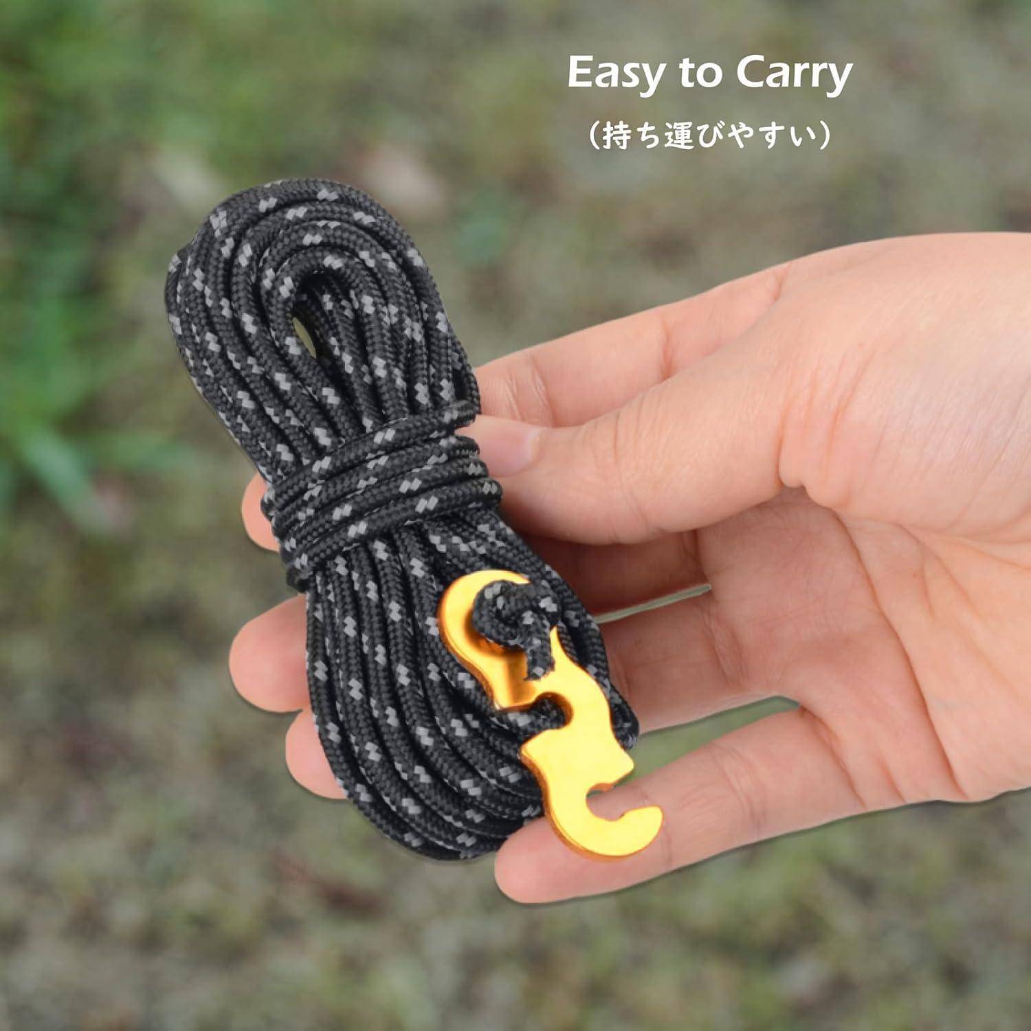 Eine Hand hält ein Bündel aus schwarzen und weißen Seilen mit einem angehängten gelben Haken. Der Text lautet „Easy to Carry