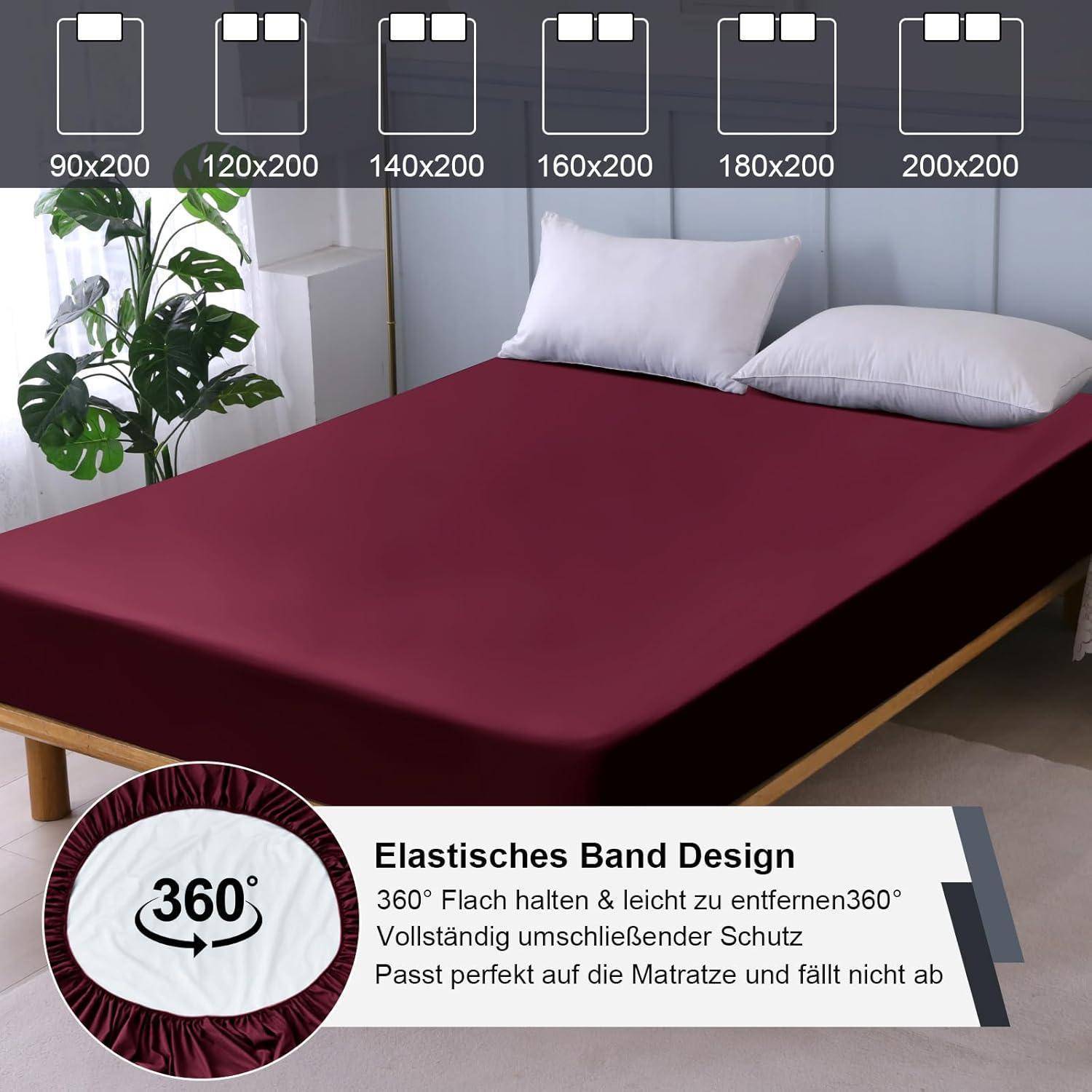 Ein dunkelrotes Spannbettlaken auf einem Bett mit einem Kissen, beschriftet mit verschiedenen Matratzengrößen von 90x200 bis 200x200 cm. Mit einem 360° elastischen Gummizug.