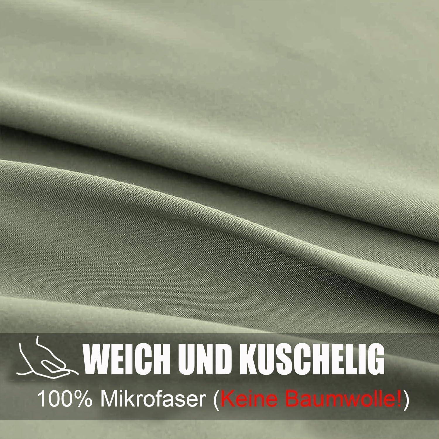 Grüner Mikrofaserstoff, mit dem Etikett 'Weich und kuschelig', betont Weichheit. Der Text vermerkt '100% Mikrofaser (Keine Baumwolle!)', was den Verzicht auf Baumwolle verdeutlicht.