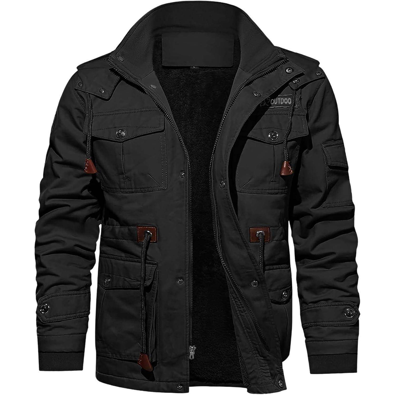 Eine schwarze Outdoor-Jacke mit mehreren Taschen, Reißverschlüssen und einer Kapuze, die vor einem weißen Hintergrund präsentiert wird.
