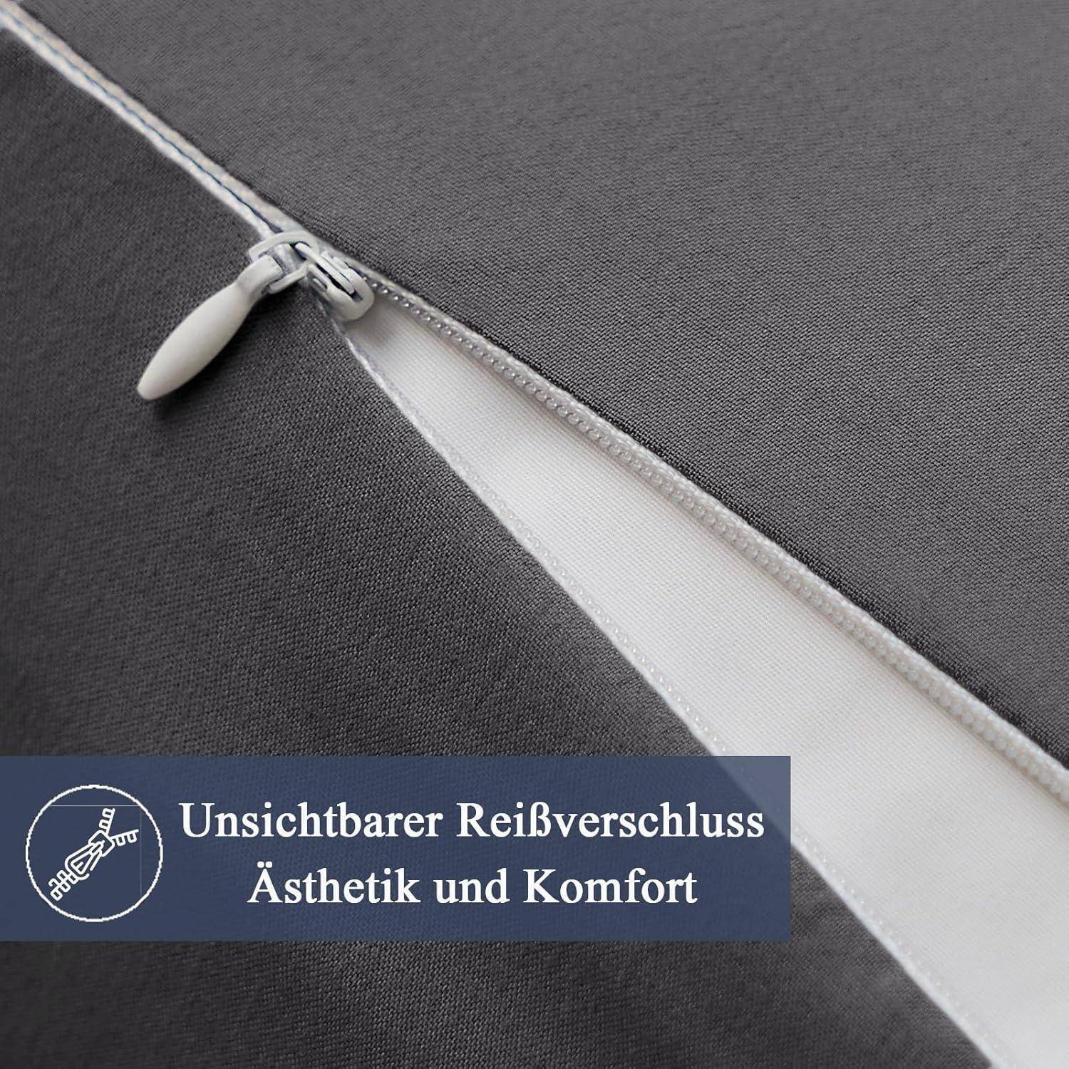 Eine Nahaufnahme eines grauen Kissenbezugs mit einem weißen unsichtbaren Reißverschluss. Text in einem blauen Kreis liest: „Unsichtbarer Reißverschluss - Ästhetik und Komfort.
