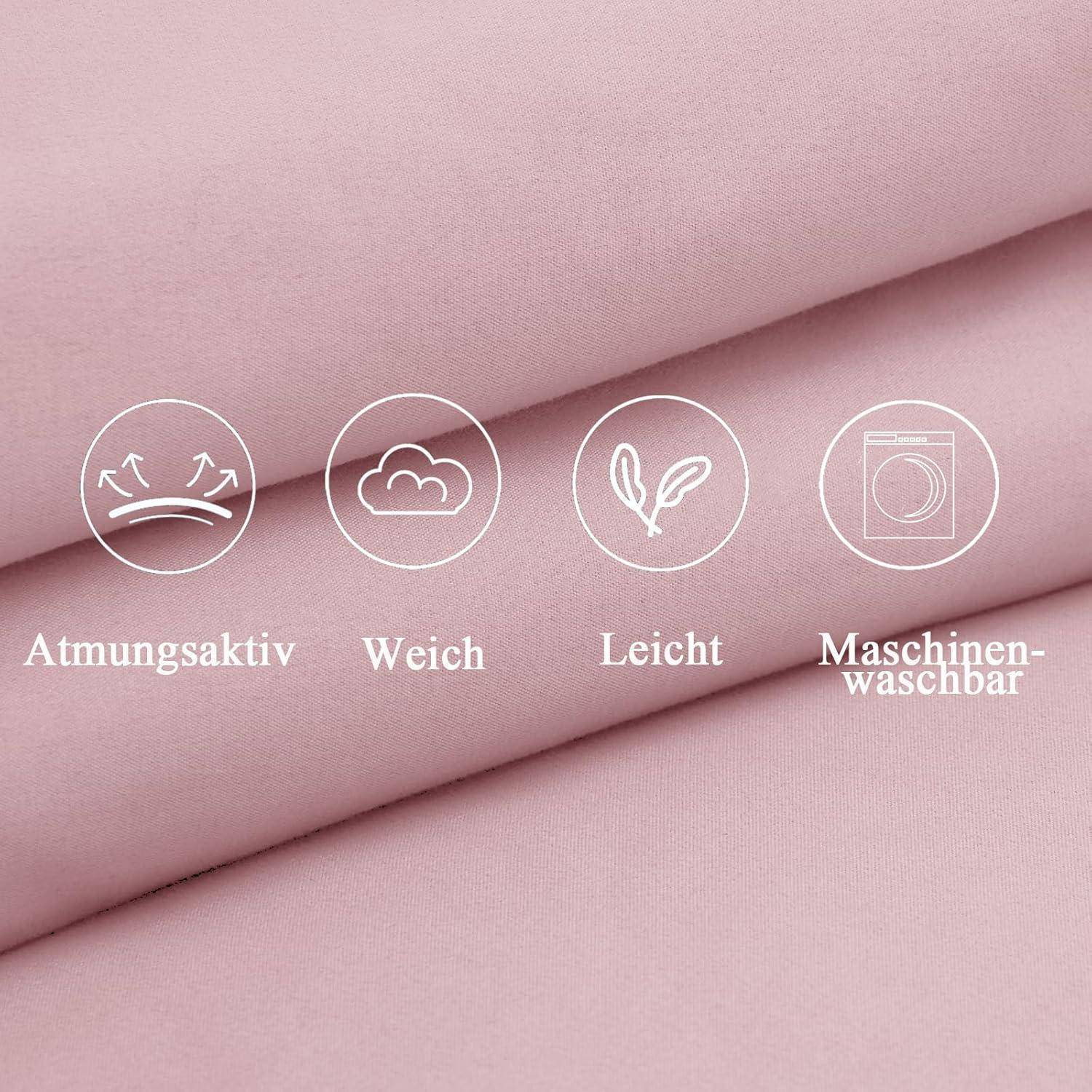 Weicher rosa Stoff mit Symbolen, die 