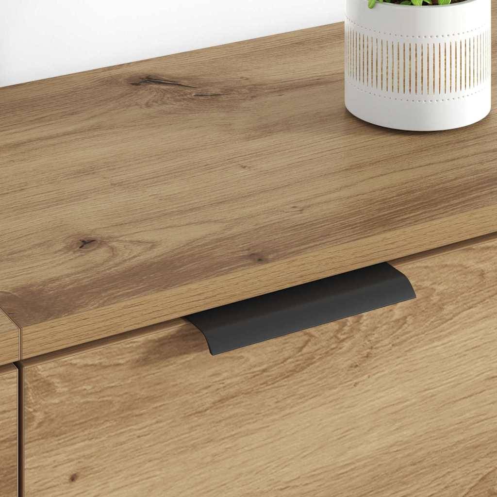 Holztischplatte mit einem schwarzen Griff, auf der eine Pflanze in einem weißen Topf mit Musterdesign steht.