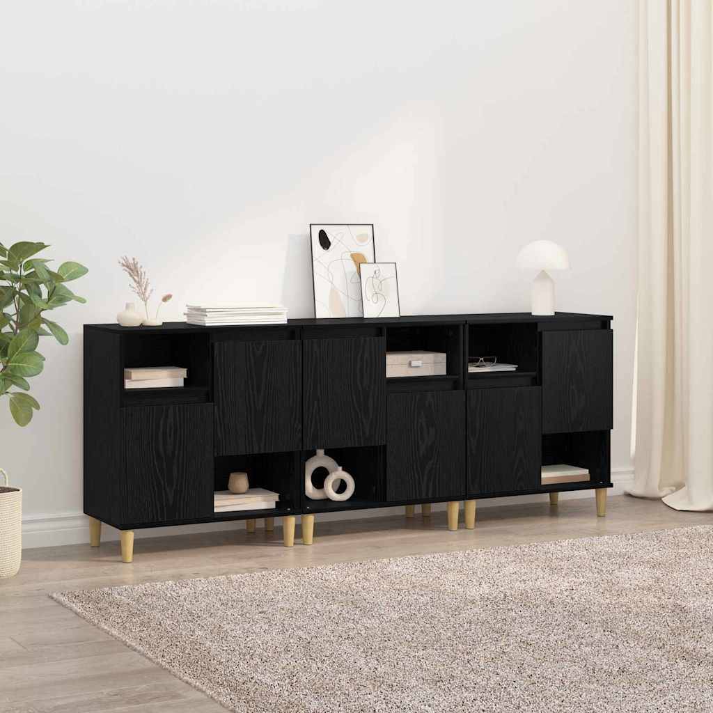 Ein schwarzes Holz-Sideboard mit dekorativen Gegenständen wie Vasen, Büchern und gerahmten Kunstwerken darauf. Steht in einem Wohnzimmer mit einem beigen Teppich.