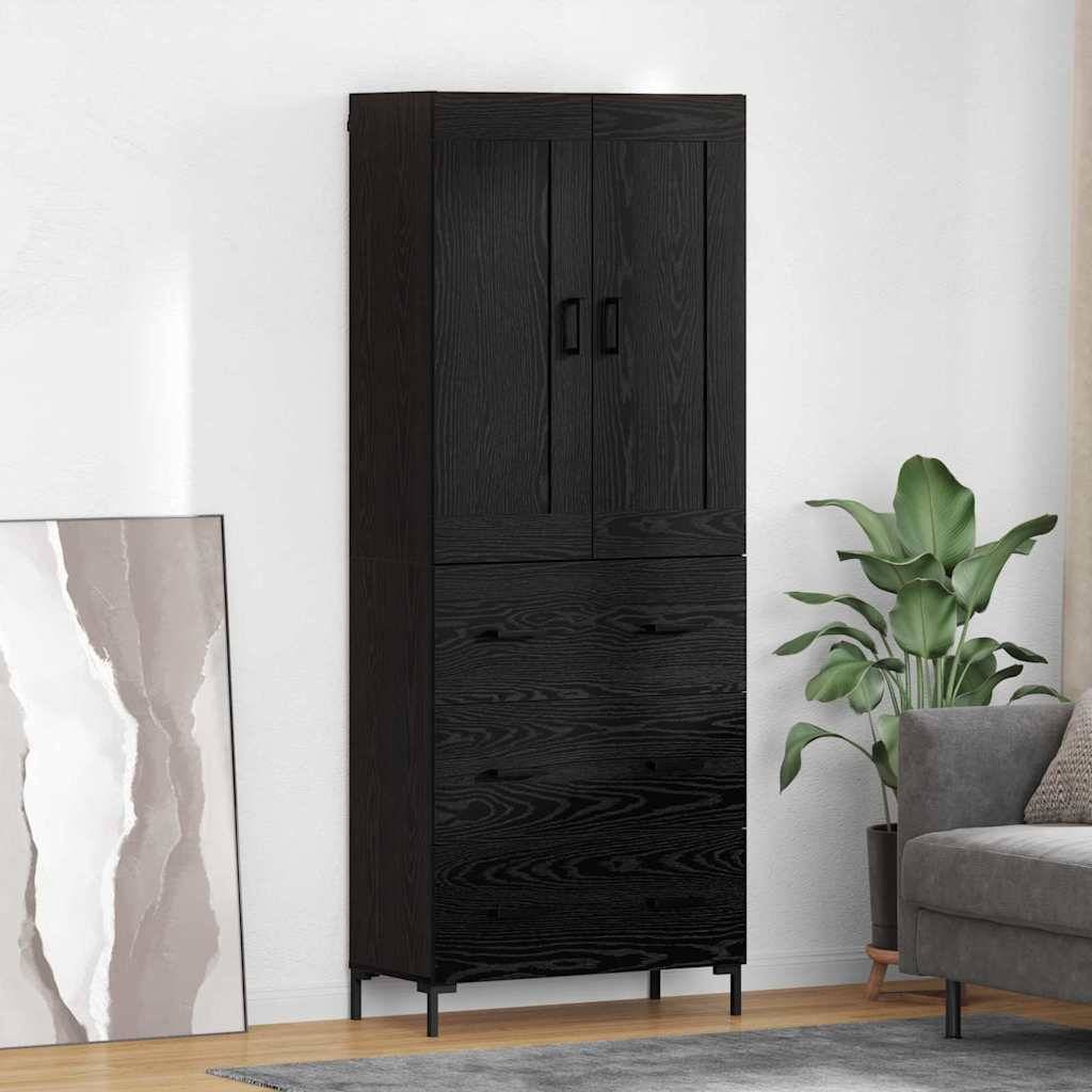 Ein hoher, dunkler Holzschrank mit zwei oberen Türen und einer unteren Schublade steht in einem gemütlichen Wohnzimmer neben einer Pflanze und einem modernen Kunstwerk.