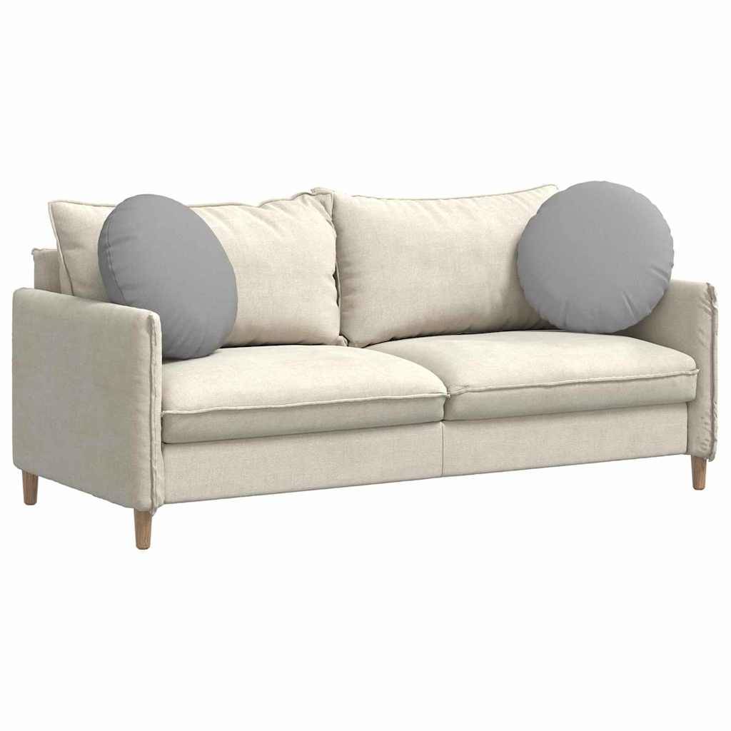 Ein beige Sofa mit zwei grauen runden Kissen, das ein modernes rechteckiges Design und Holzbeine aufweist, steht vor einem schlichten Hintergrund.