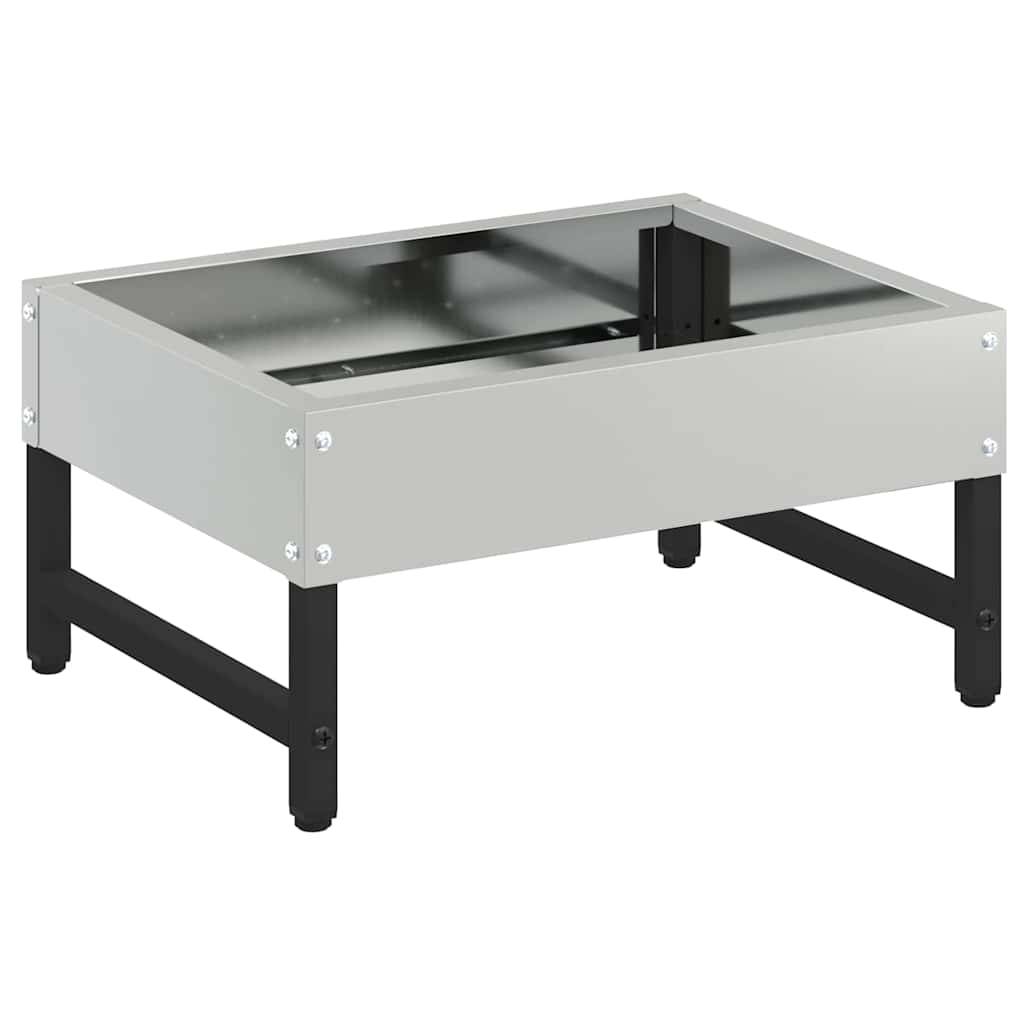 Metallische Tischbasis mit Glasplatte und sichtbaren Schrauben an den Ecken, mit schwarzen Beinen und einem offenen Fach darunter.