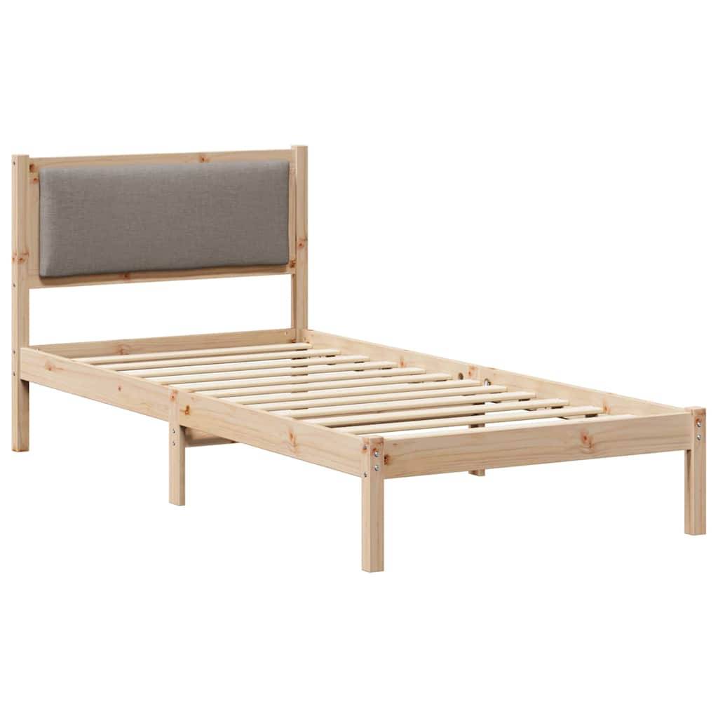 Ein Holz-Einzelbettrahmen mit einer hellen Holzoberfläche und einem gepolsterten grauen Kopfteil, versehen mit gleichmäßig angeordneten Latten.