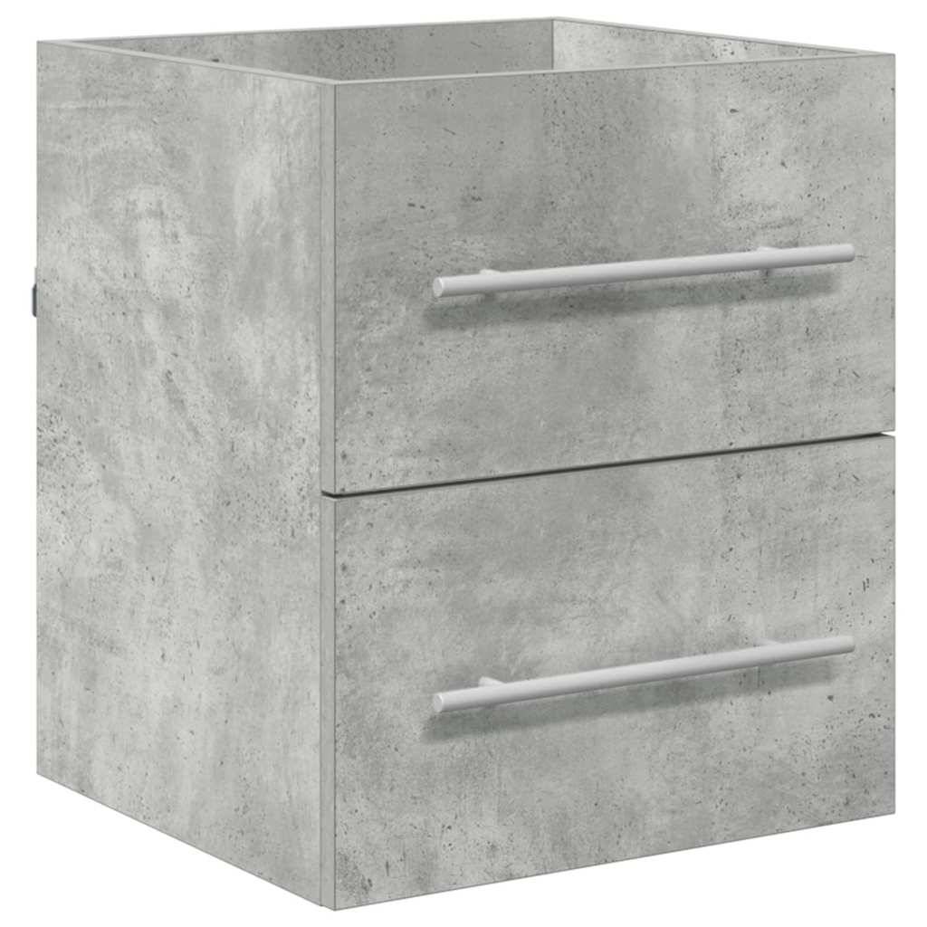 Ein Zwei-Schubladen-Schrank mit Betonstruktur-Oberfläche und schlanken horizontalen Griffen.