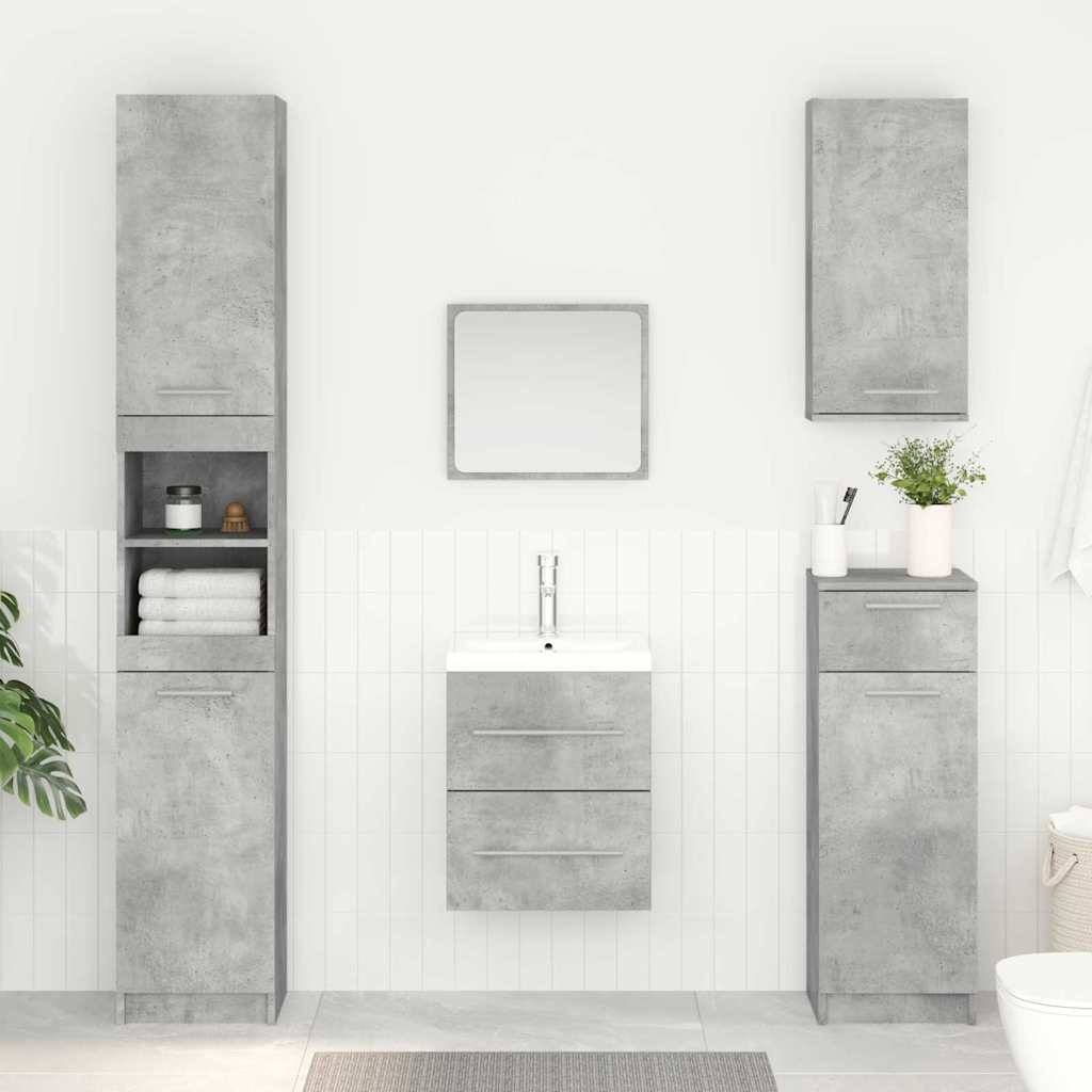 Ein minimalistisches Badezimmer präsentiert graue, steinstrukturierte Schränke, einen zentralen Spiegel über einem Waschbecken-Waschtisch und ordentlich gefaltete Handtücher.