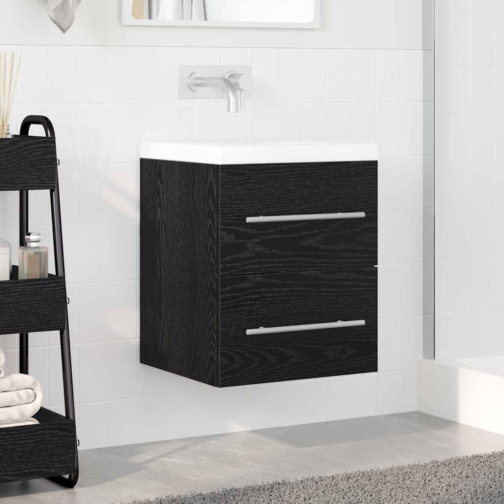 Ein modernes Badezimmer zeigt einen wandmontierten schwarzen Waschtisch mit zwei Schubladen und einem silbernen Wasserhahn darüber, angrenzend an einen Duschbereich.