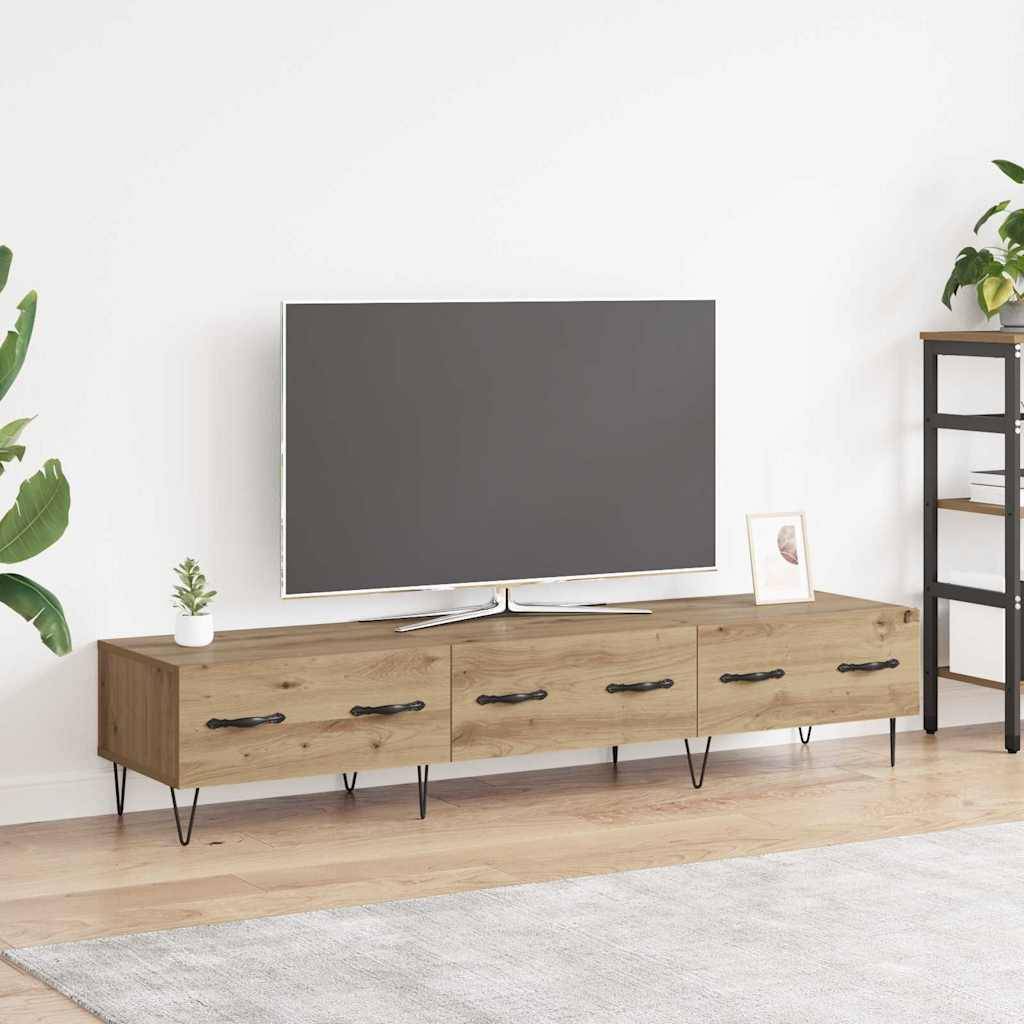 Ein moderner Wohnraum zeigt einen großen Flachbildfernseher auf einem Holz-Medienschrank mit Schubladen. Eine kleine Pflanze und gerahmte Kunst verleihen dem Raum Dekoration.