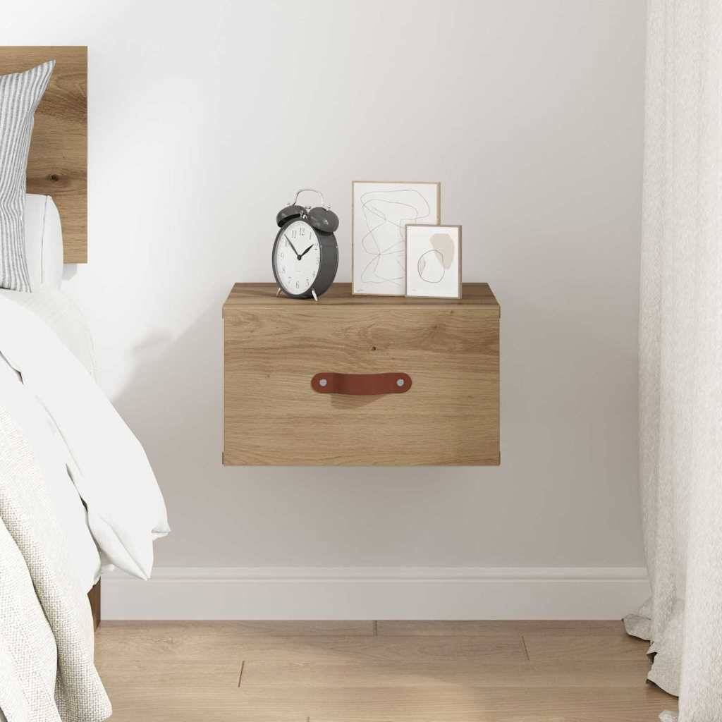 Ein minimalistisches Schlafzimmer zeigt ein schwebendes Holznachtkästchen mit einer kleinen Uhr, abstrakten Kunstwerken und einem ordentlich gemachten Bett mit weißer Bettwäsche.