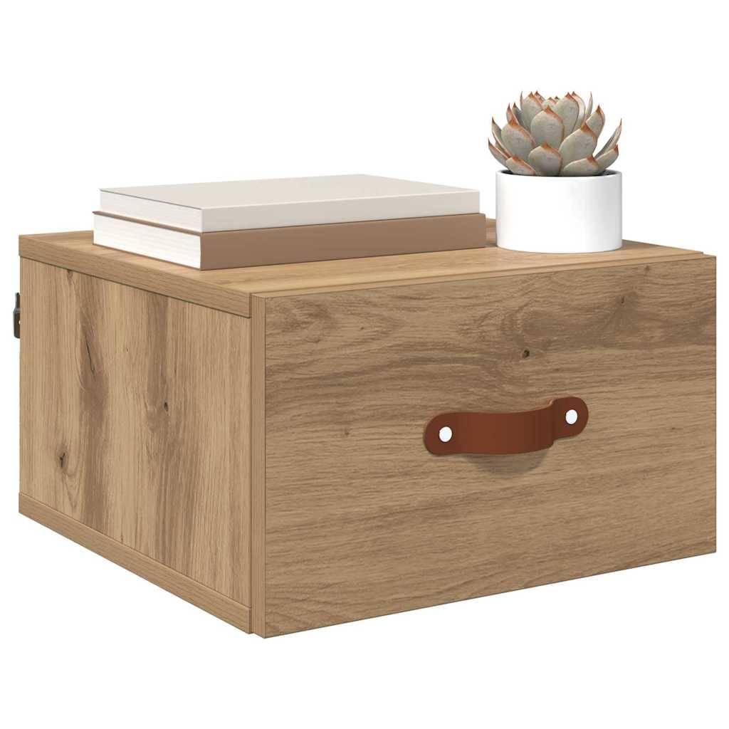 Holzaufbewahrungsbox mit einem Ledertragegriff, gekrönt von zwei geschlossenen Büchern und einer kleinen Sukkulente in einem Topf.
