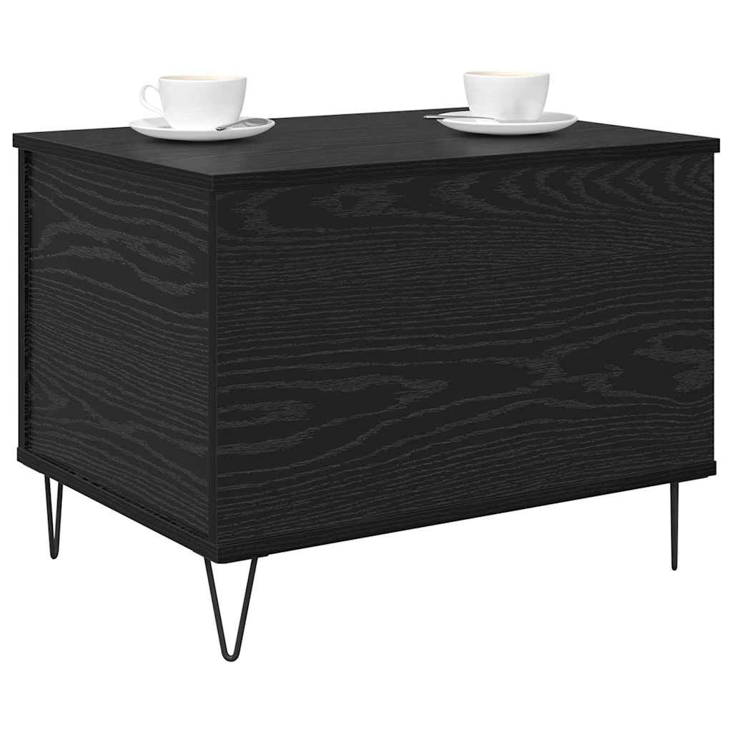 Schwarzer Holz-Couchtisch mit zwei Tassen auf der Oberfläche, ausgestattet mit Hairpin-Beinen aus Metall. Der Tisch hat eine strukturierte Holzmaserung.