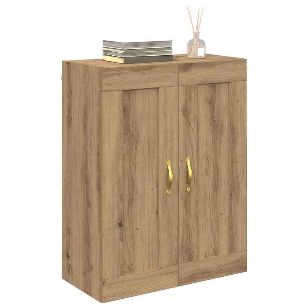 Holzschrank mit zwei Türen und goldenen Griffen, oben belegt mit einem Stapel Bücher und einem Glasgefäß mit Reedstäbchen, was auf ein Dufterlebnis hindeutet.