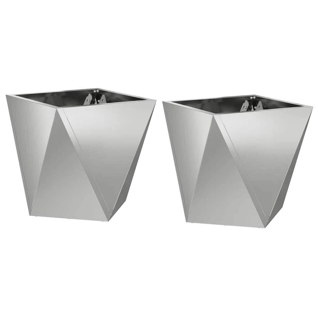 Zwei geometrische Metallpflanztöpfe mit kantig-facettiertem Design, nebeneinander platziert.