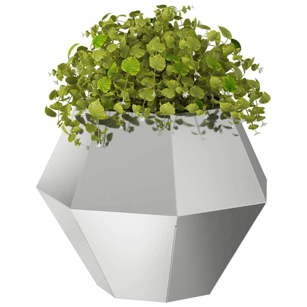 Geometrischer Metallpflanzer mit üppiger grüner Bepflanzung.