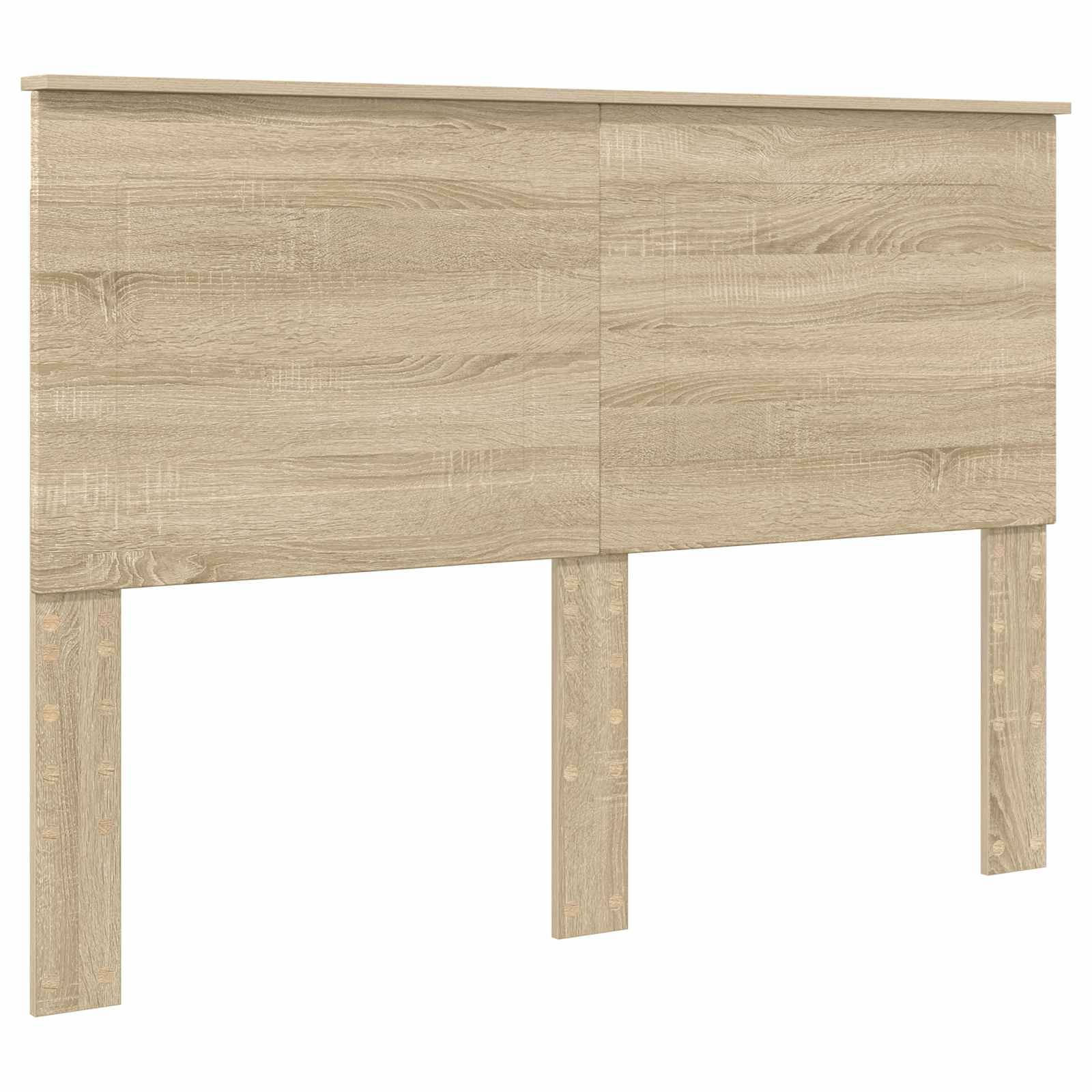 Ein Kopfteil aus Holz mit zwei Beinen, mit einer hellen Eichenfinish und horizontalem Körnung. Das Design ist einfach und modern.