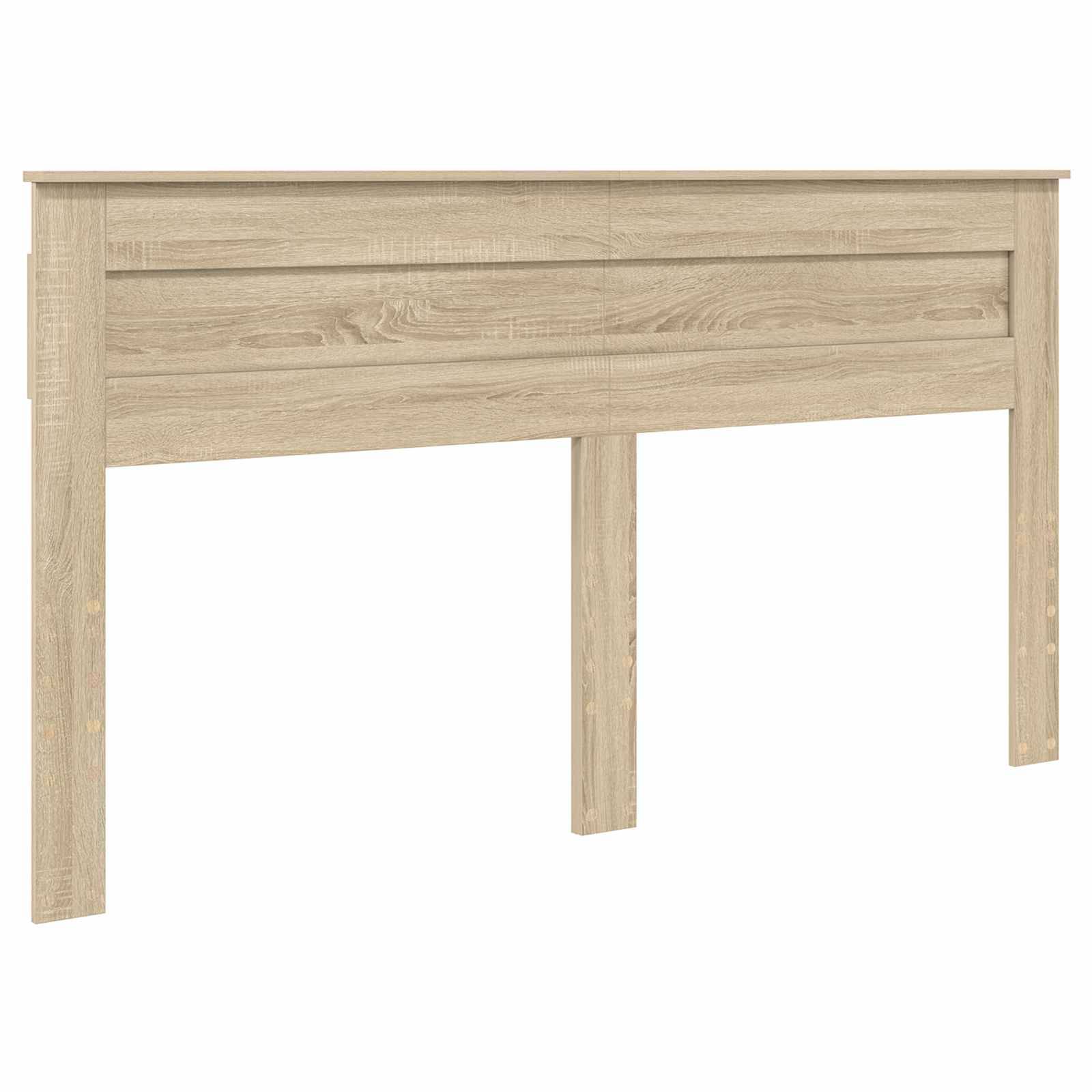 Ein Holzkopfteil mit hellem Eichenfinish, das ein einfaches Paneldesign aufweist und sich für einen Bettrahmen eignet.