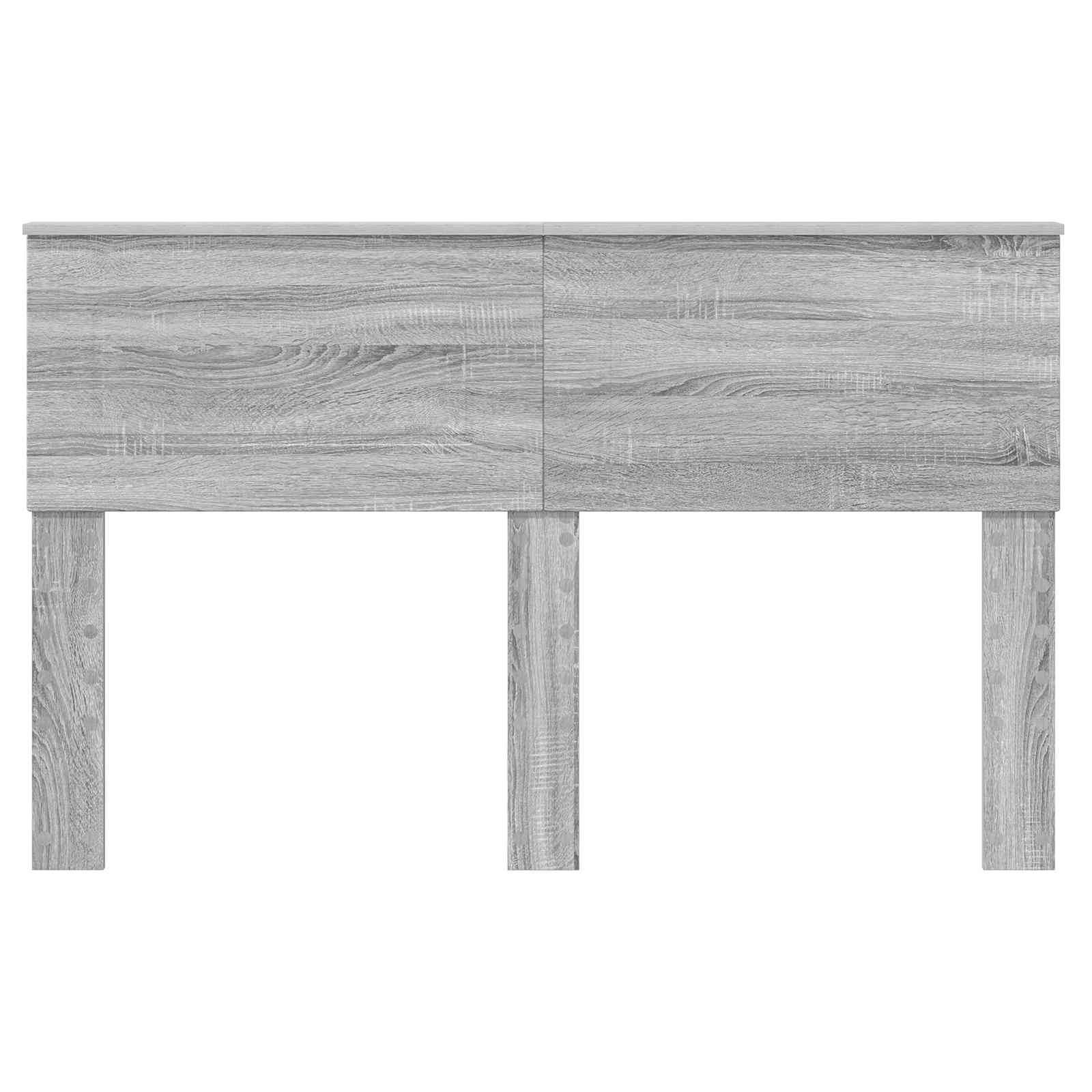 Ein minimalistisches graues Holzsideboard mit strukturierter Oberfläche und drei vertikalen Paneelen, entworfen für moderne Wohn- oder Büroumgebungen.