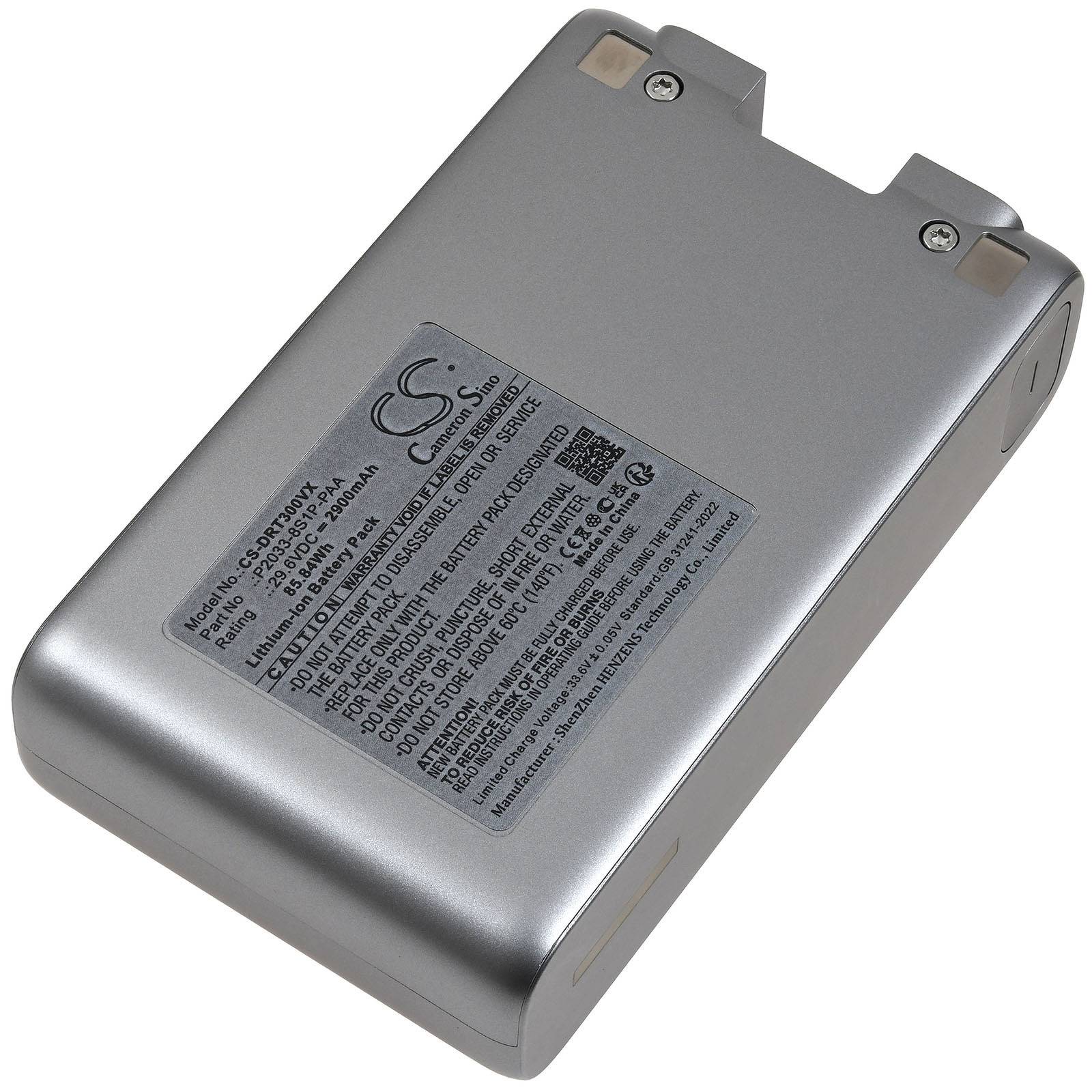 Eine rechteckige, silberne Ersatzbatterie für Canon-Kameras; Text auf dem Etikett enthält Sicherheitswarnungen, Kapazitätsangaben und Kompatibilitätsdetails.