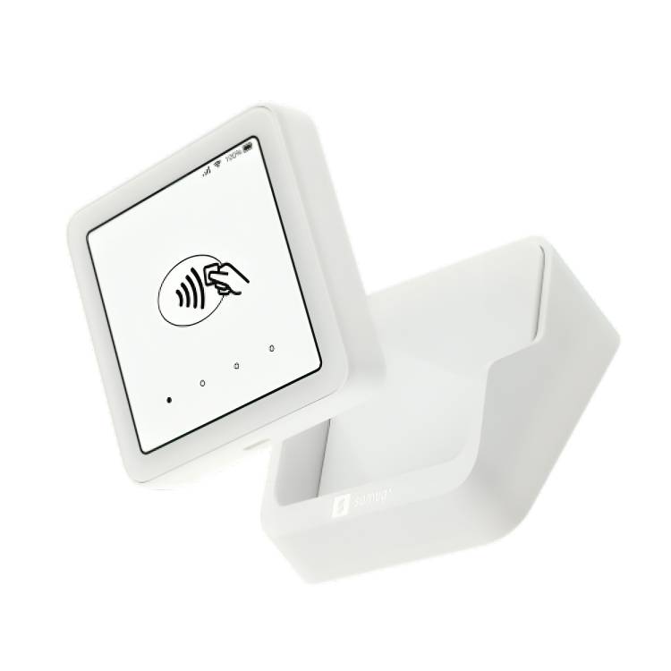 Weißer Kontaktloses-Kartenleser in einer Wand- oder Arbeitsplatte-Halterung, auf dem Display ein Tap-to-Pay-Symbol angezeigt wird.