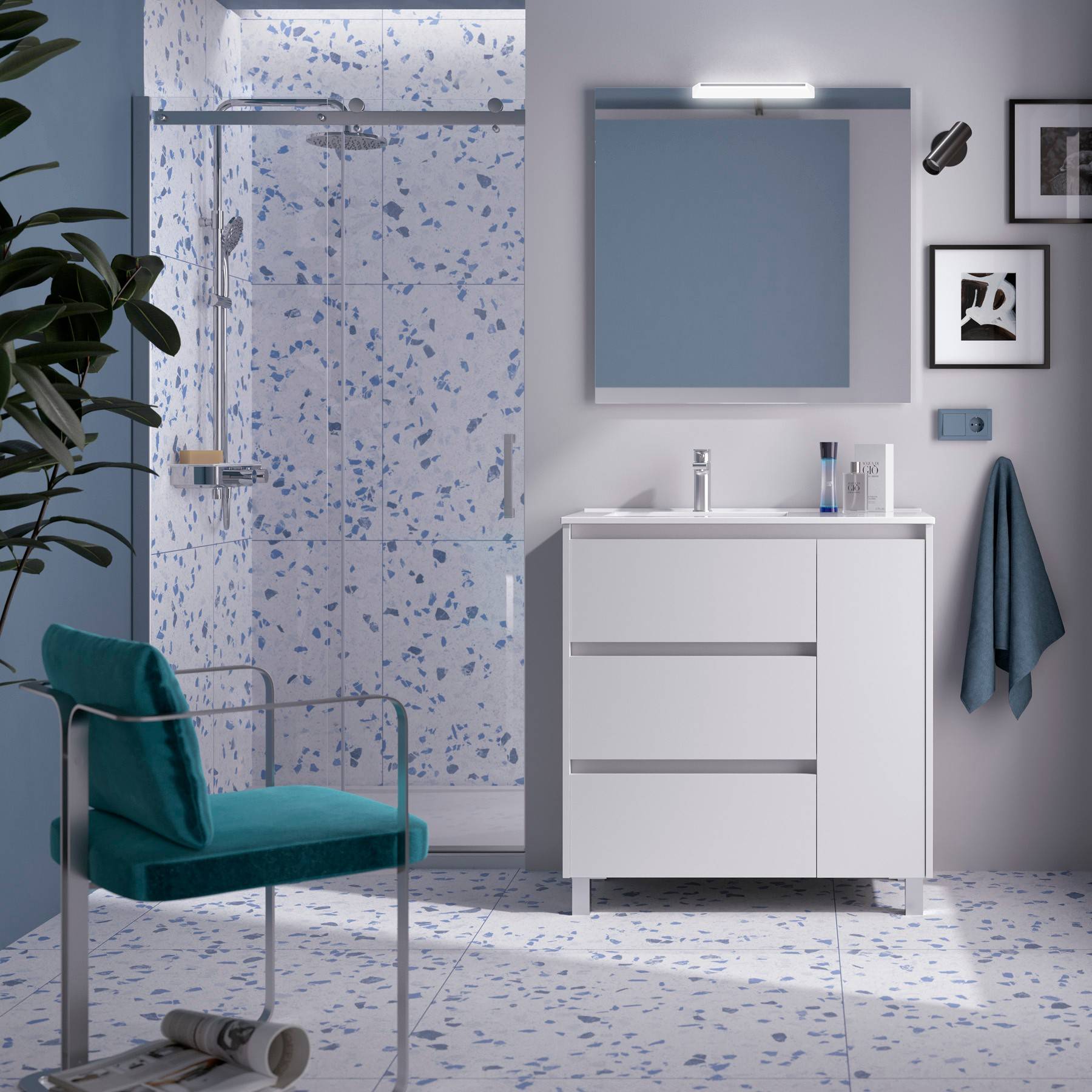 Modernes Badezimmer mit blau-weißen Terrazzoplatten, einer Glasdusche, weißem Waschtisch und türkisfarbenem Stuhl. Sanftes Licht schafft eine ruhige Atmosphäre.