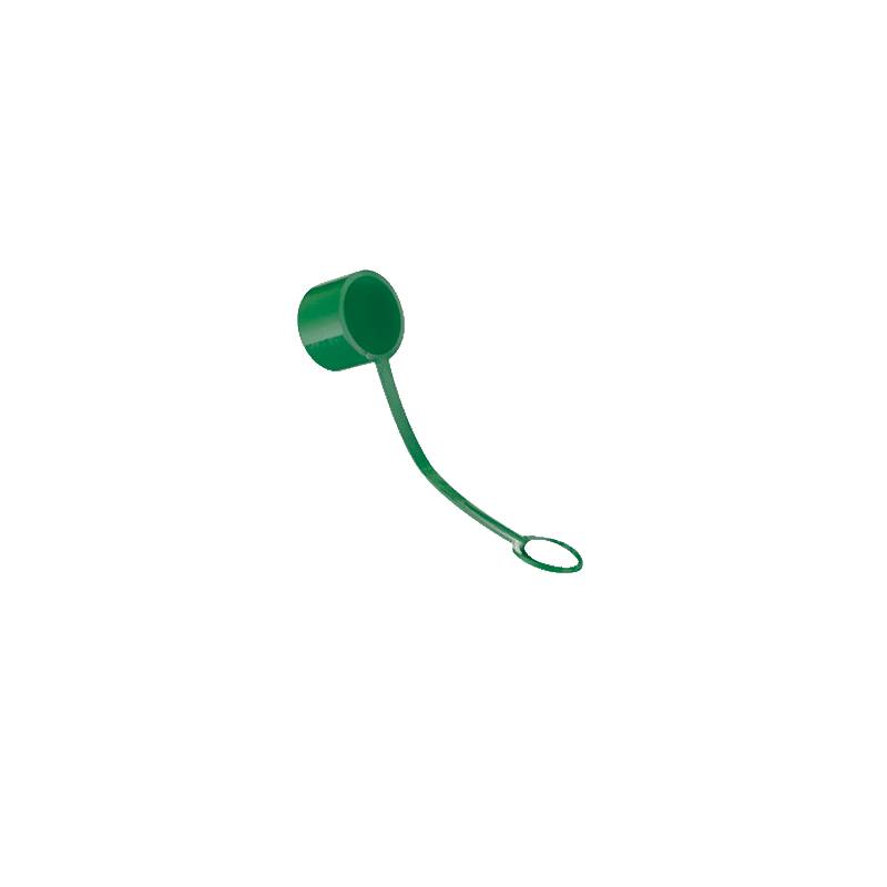 Ein kleiner grüner Plastiklöffel mit einem langen Griff auf einem schwarzen Hintergrund.