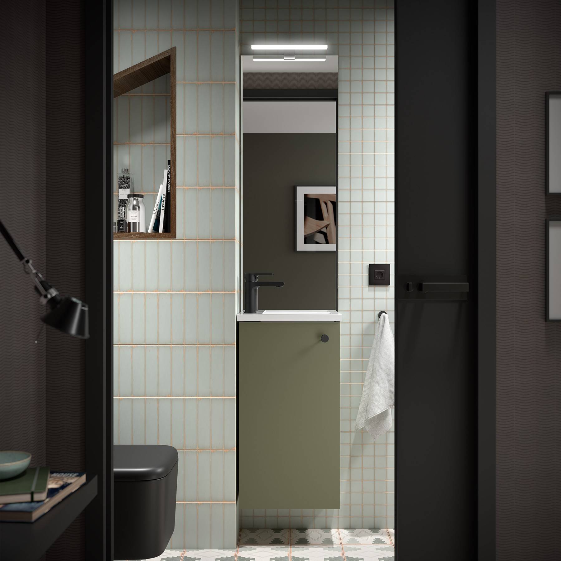 Ein modernes Badezimmer verfügt über ein schlankes Waschbecken mit einem Spiegel darüber, dunkle Wandakzente und weiches Licht, wodurch eine zeitgenössische und minimalistisch wirkende Atmosphäre entsteht.
