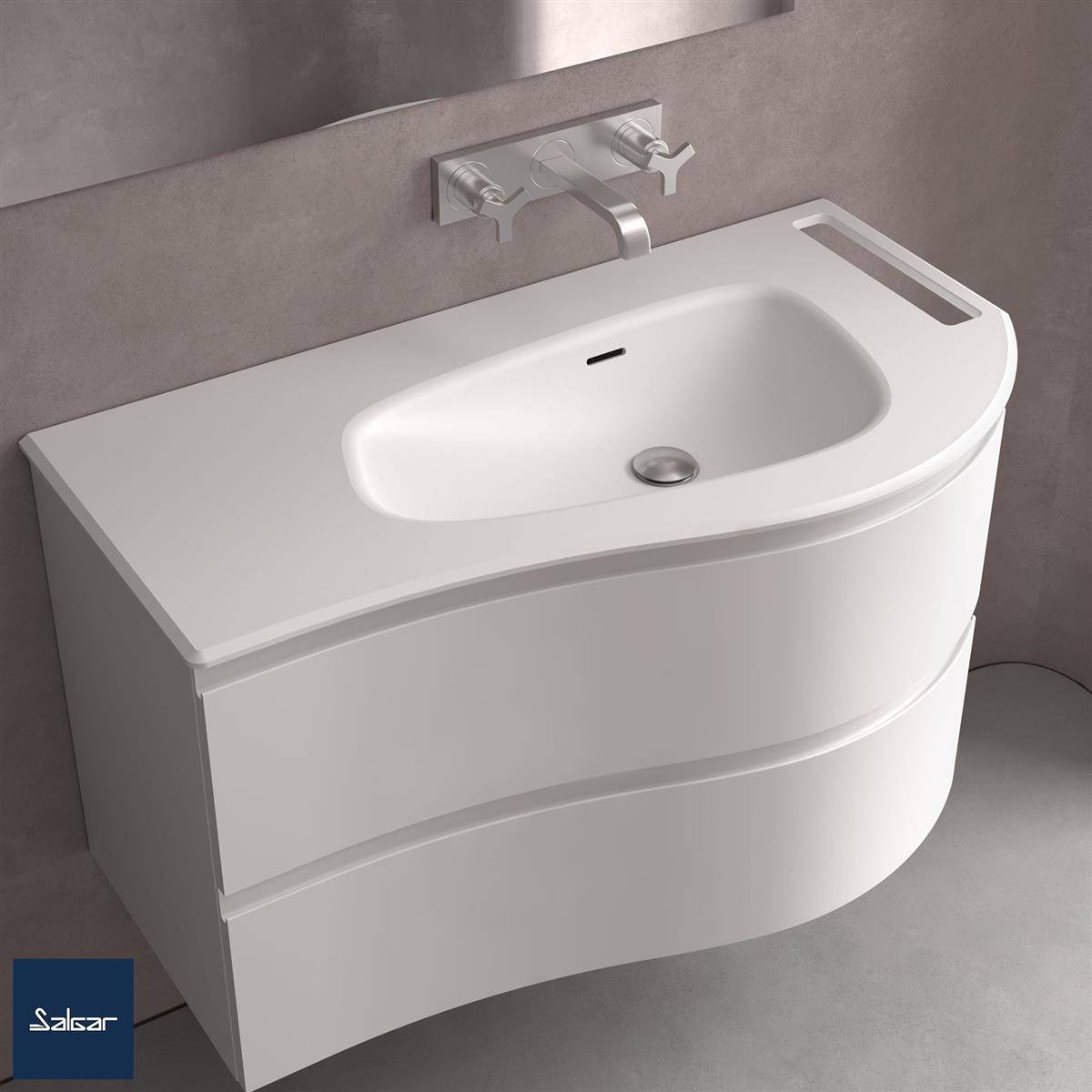 Modernes weiß beschichtetes Badezimmer-Wandwaschbecken mit geschwungener Front und einzelnem Wasserhahn an einer grauen Wand.